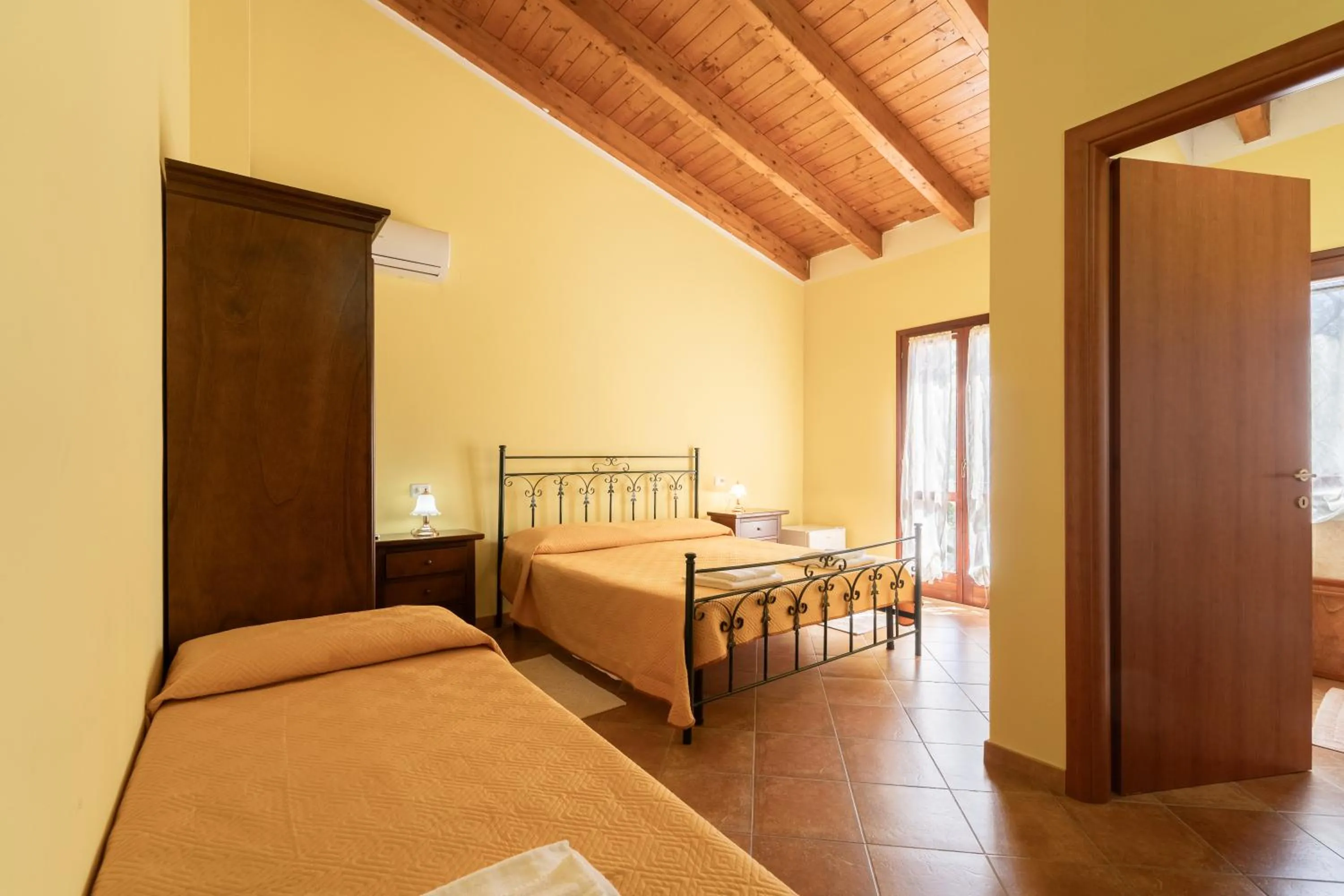 Bed in Agriturismo La Grotta Del Tesoro
