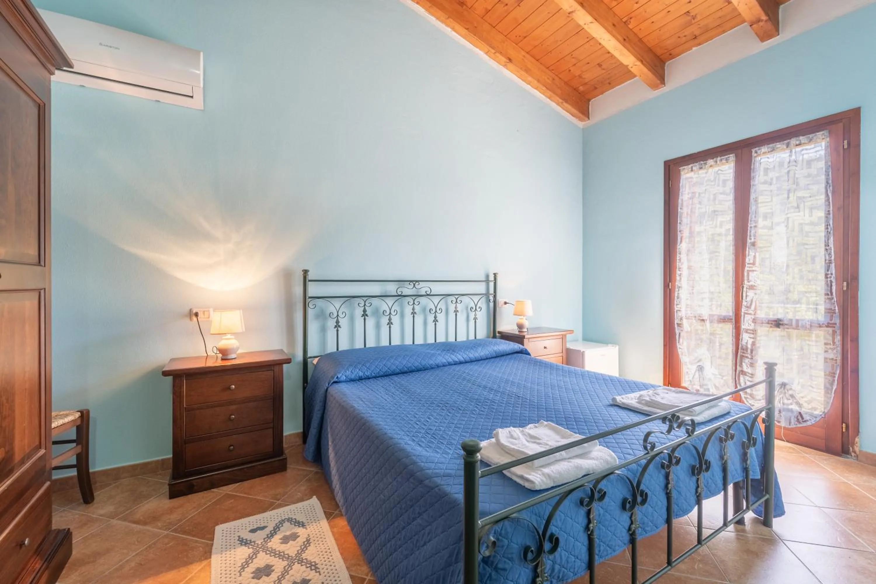 Bed in Agriturismo La Grotta Del Tesoro