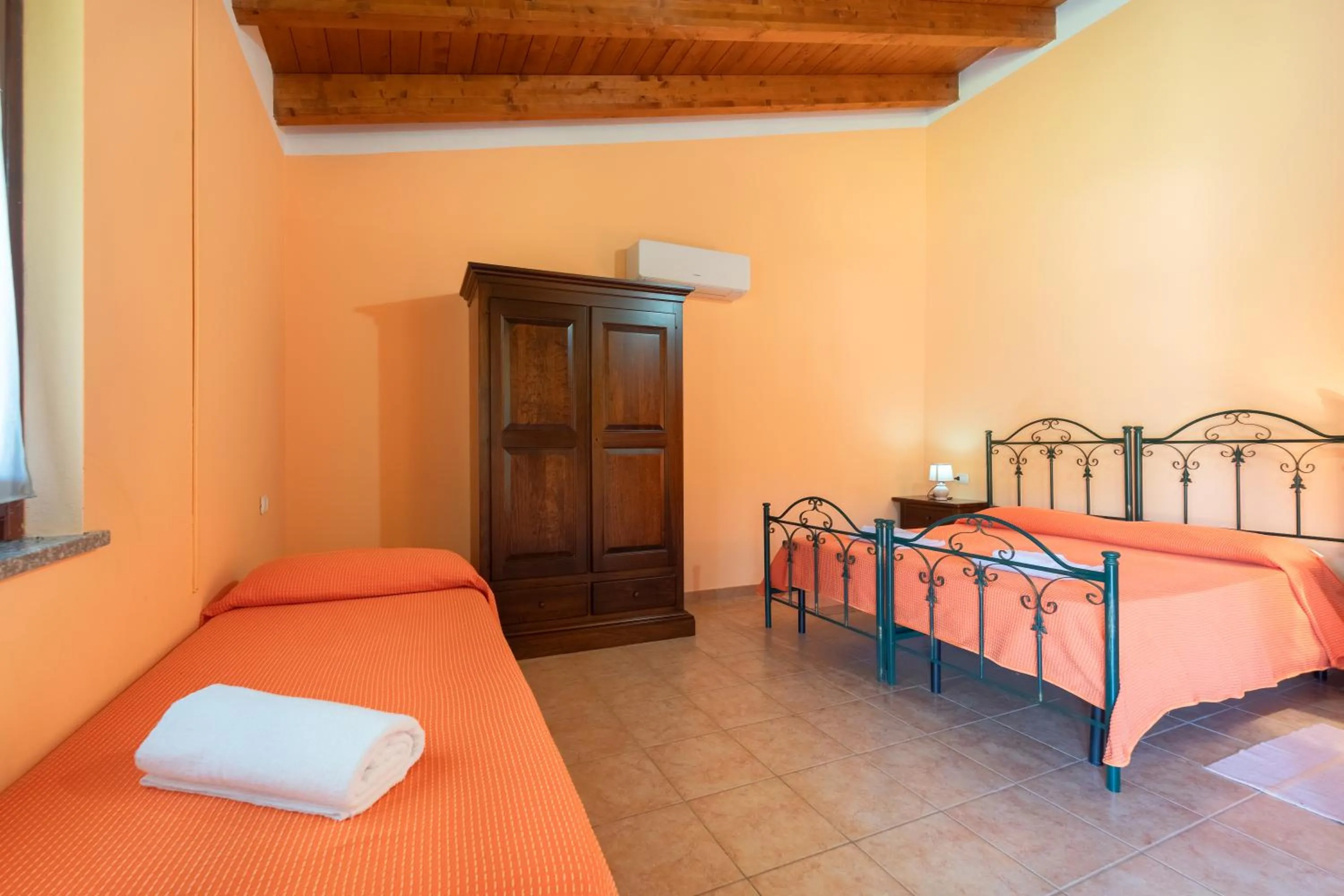 Bed in Agriturismo La Grotta Del Tesoro