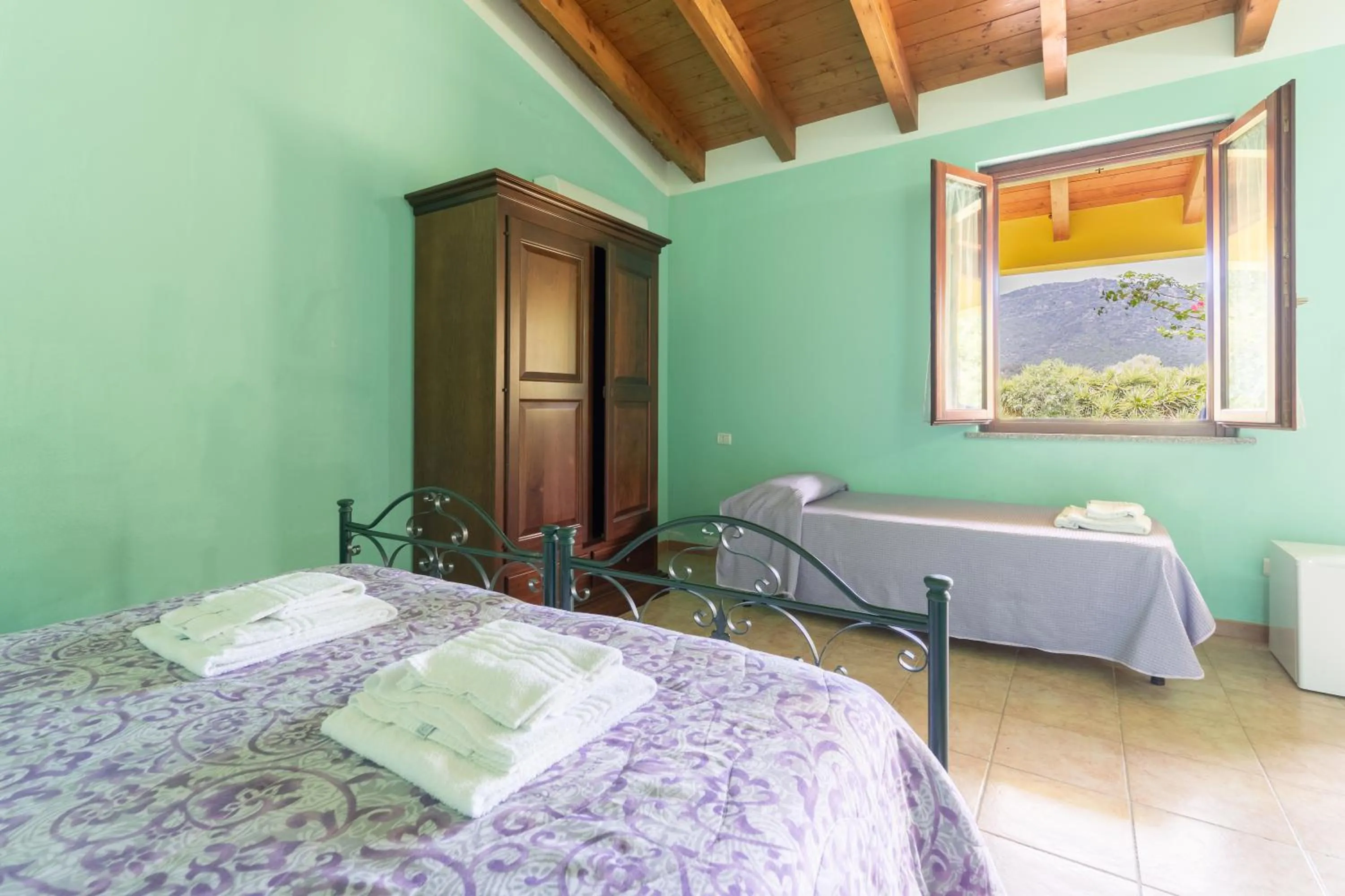 Bed in Agriturismo La Grotta Del Tesoro