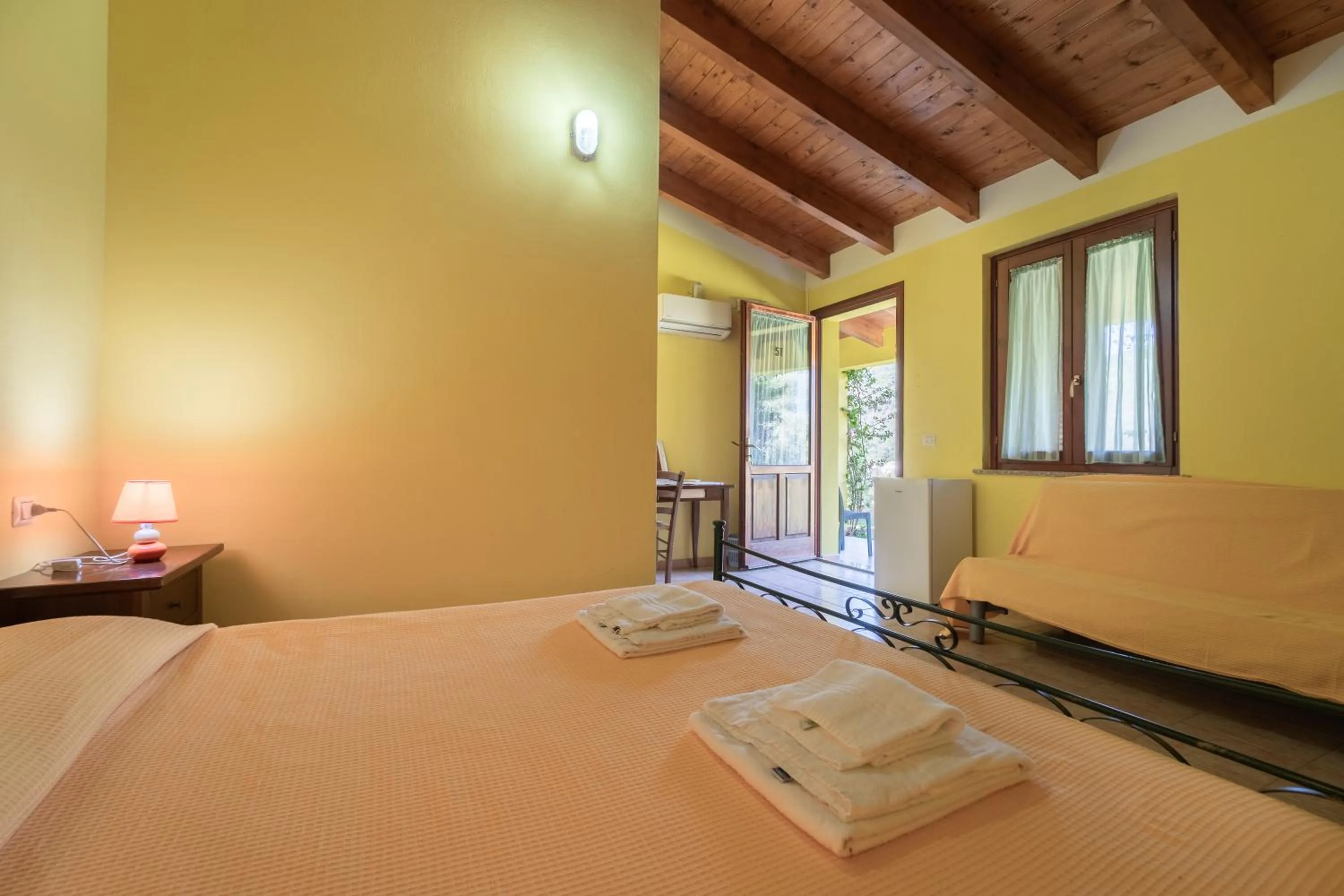 Bed in Agriturismo La Grotta Del Tesoro