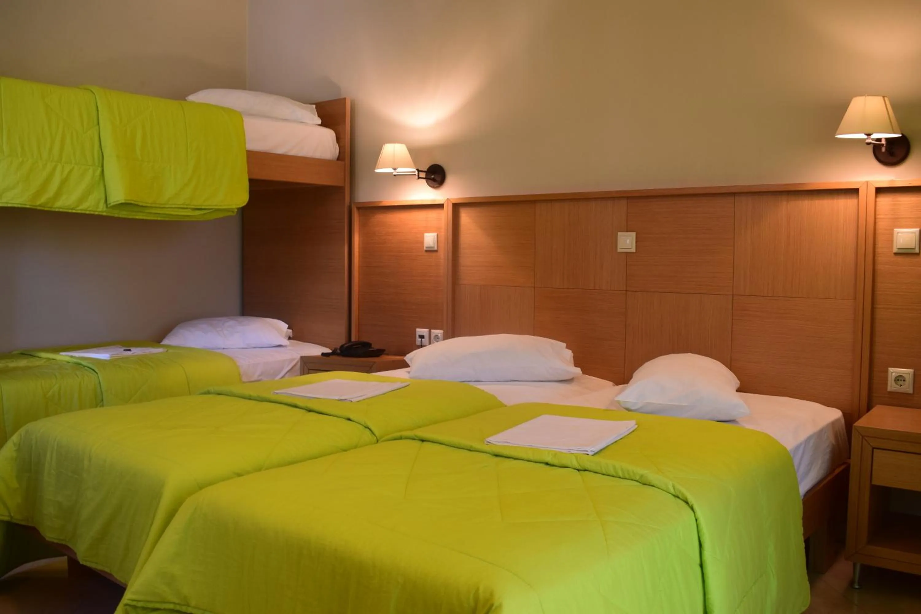 Bed in Evia Hotel & Suites