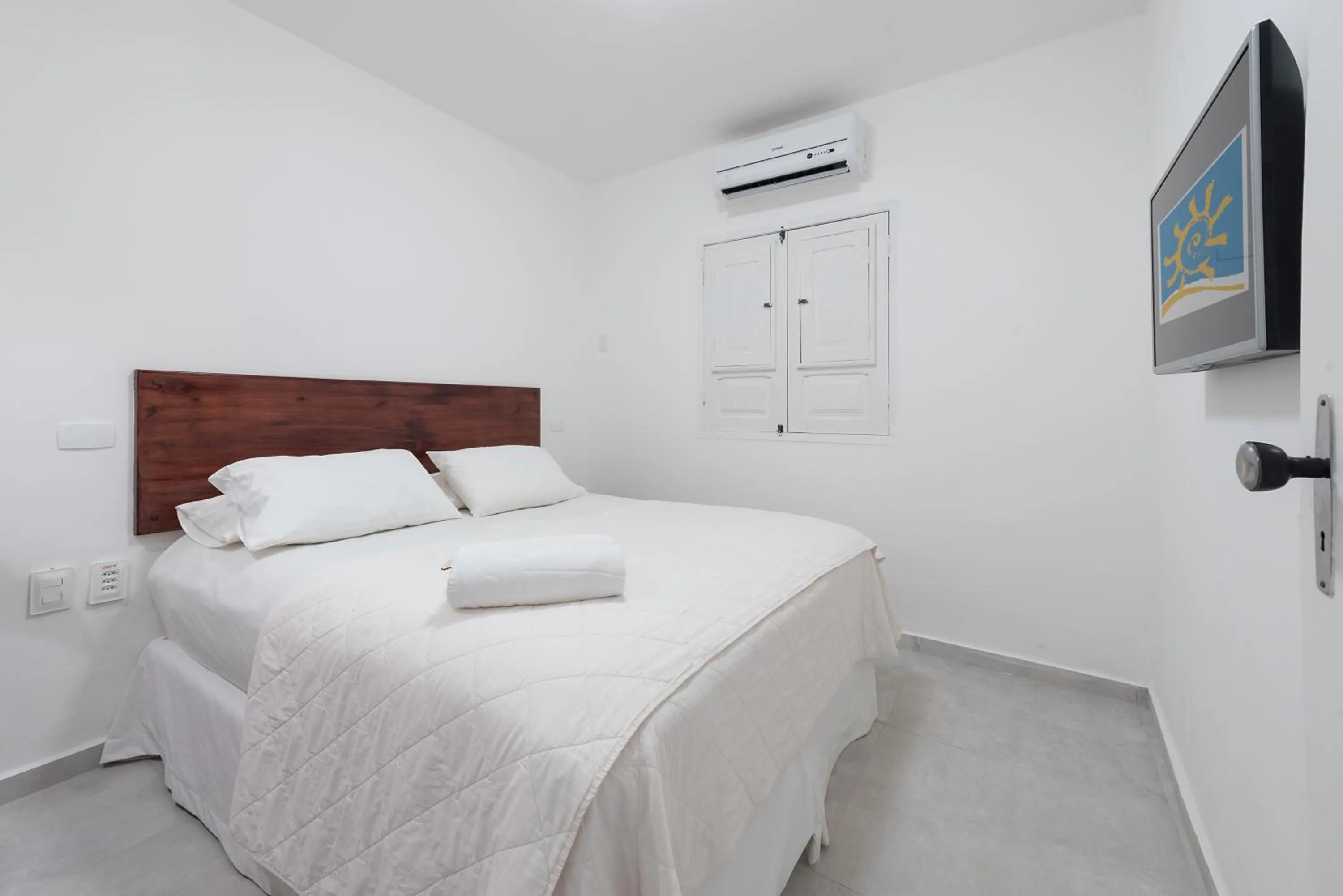 Bed in Pousada Quatro Estações