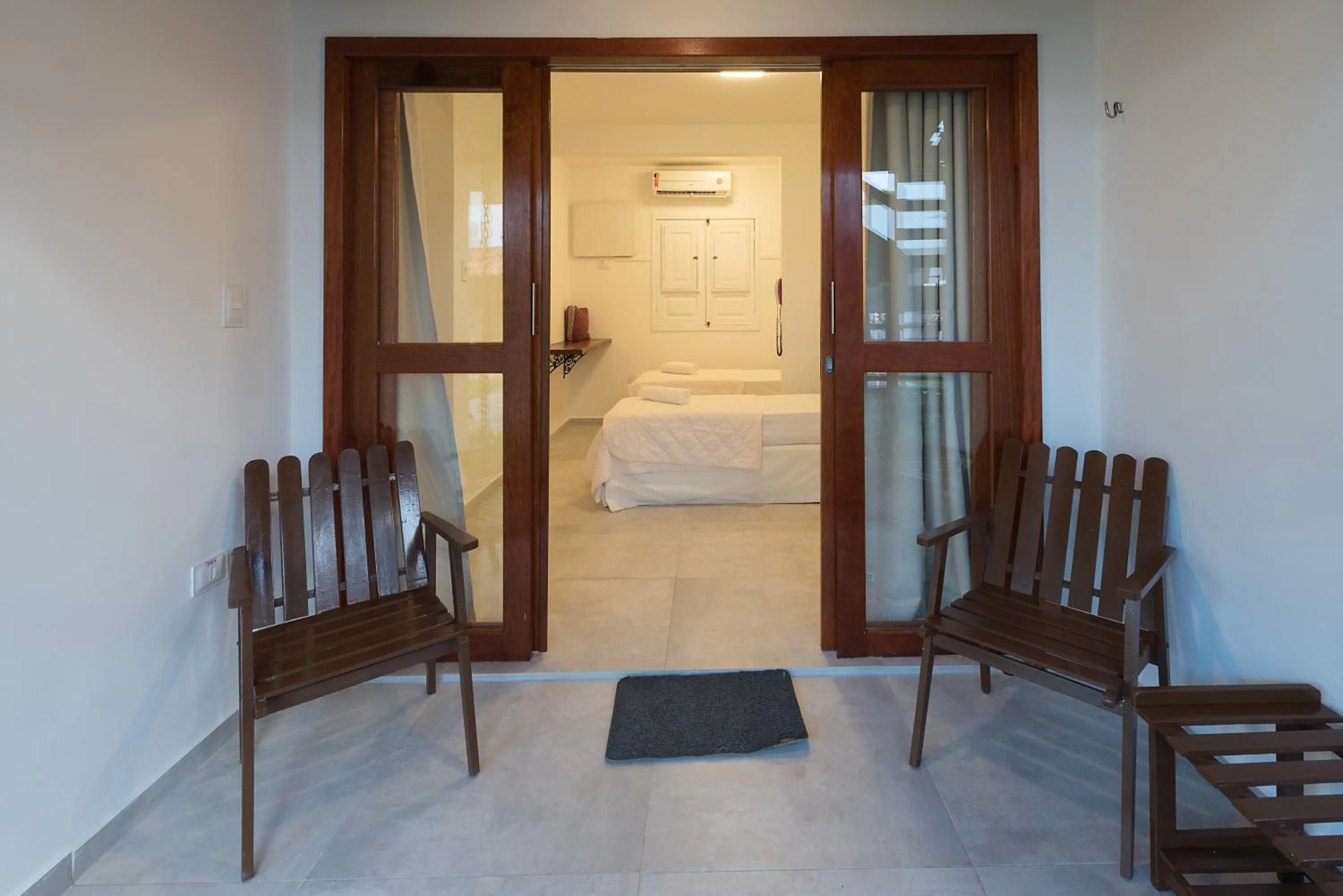 Balcony/Terrace, Bed in Pousada Quatro Estações