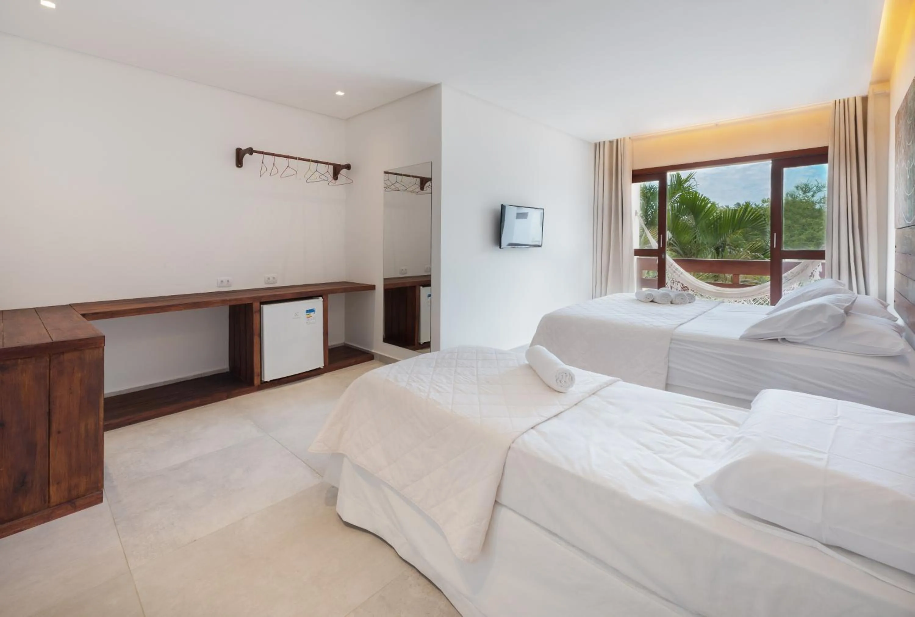 Bed in Pousada Quatro Estações