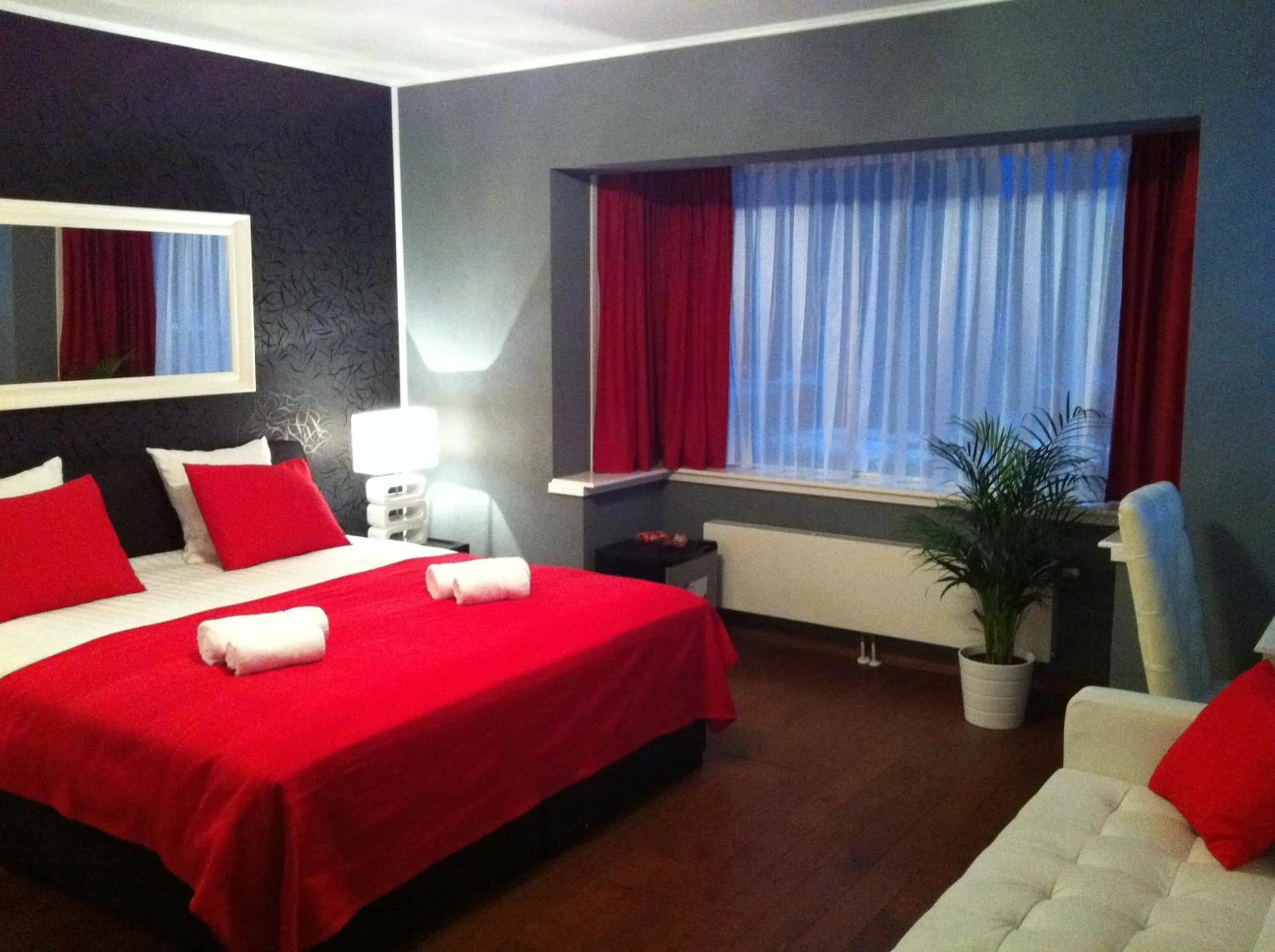 Photo of the whole room, Bed in Alex Rooms