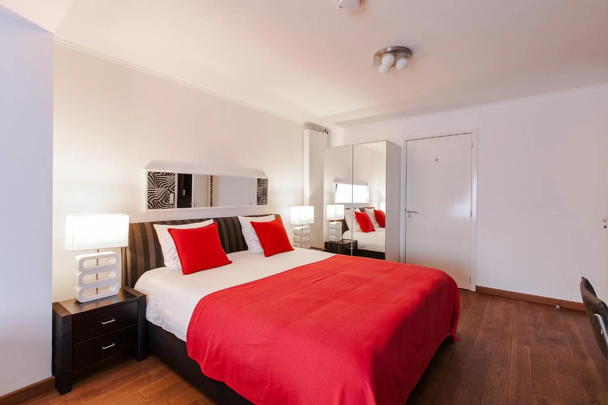 Photo of the whole room, Bed in Alex Rooms