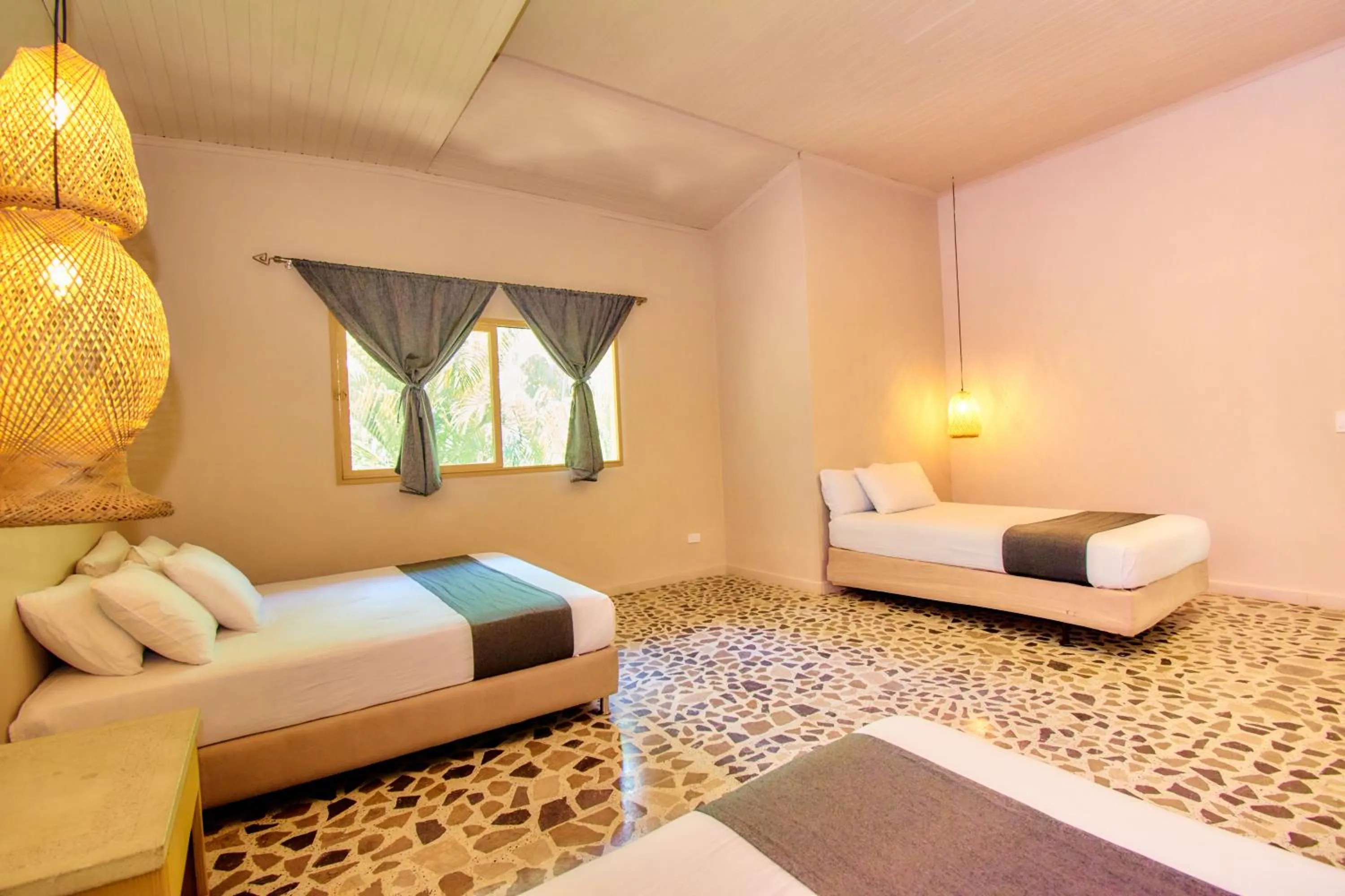 Bed in La Iguana de Santa Fe by Bernalo Hotels