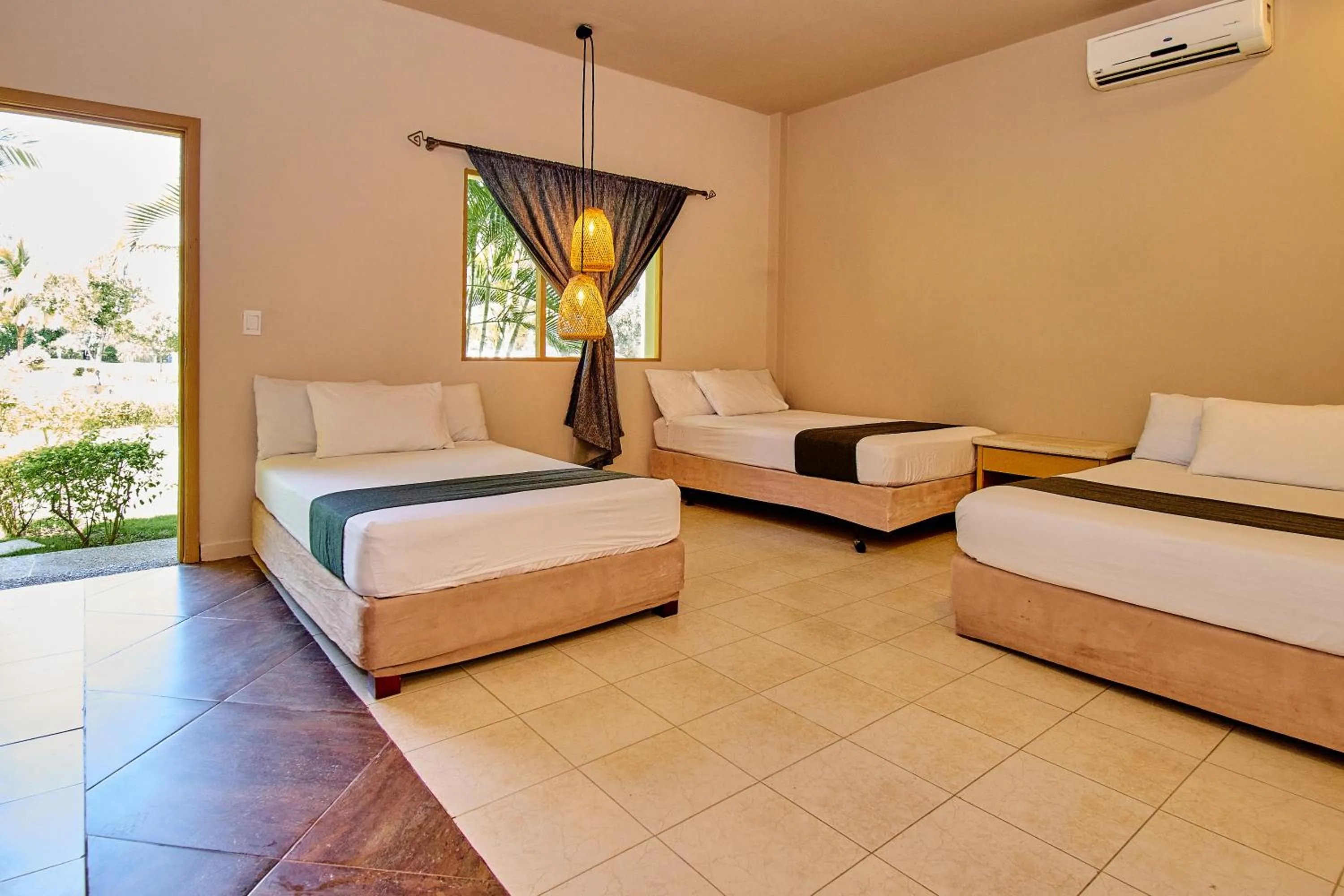 Bed in La Iguana de Santa Fe by Bernalo Hotels