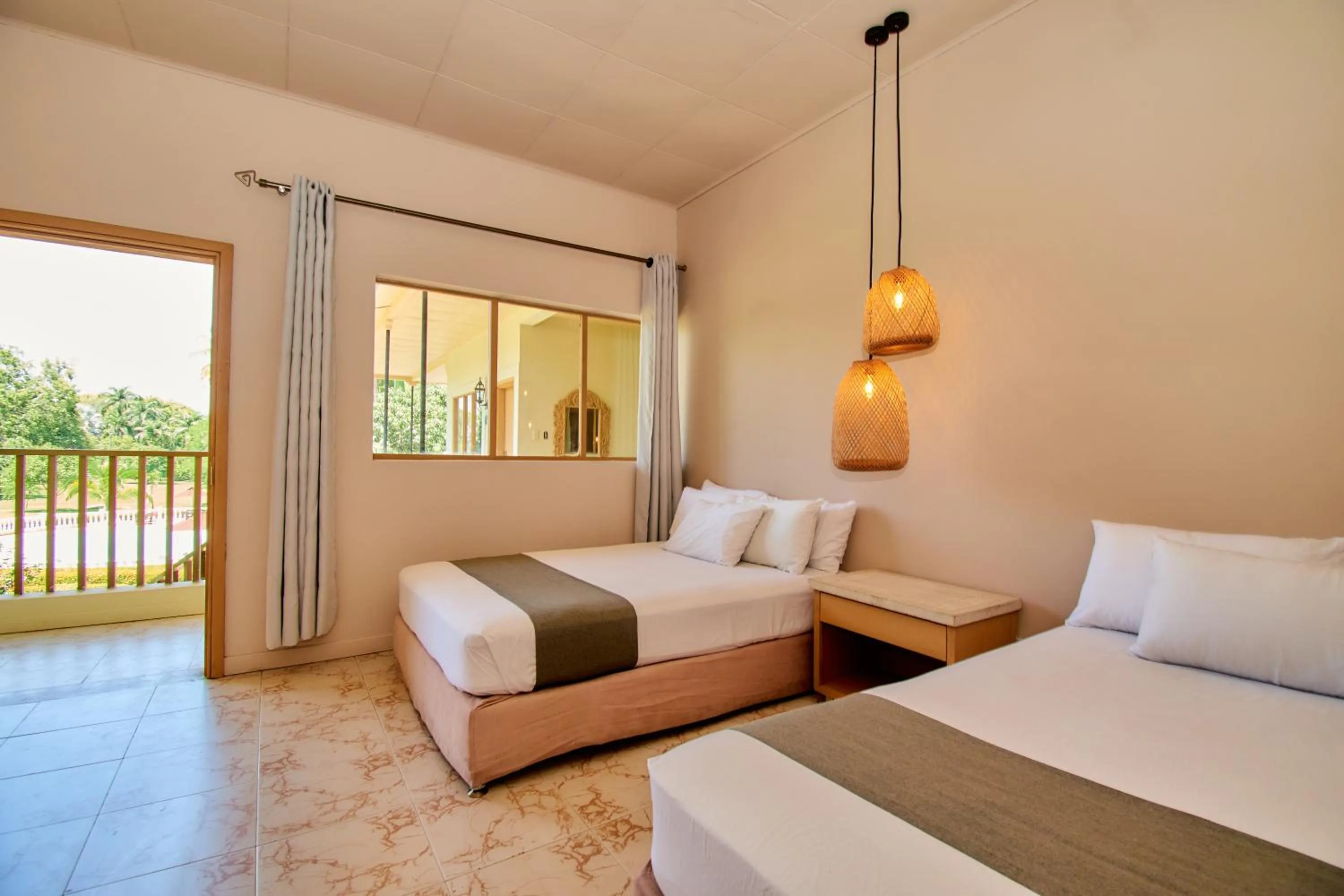 Bed in La Iguana de Santa Fe by Bernalo Hotels