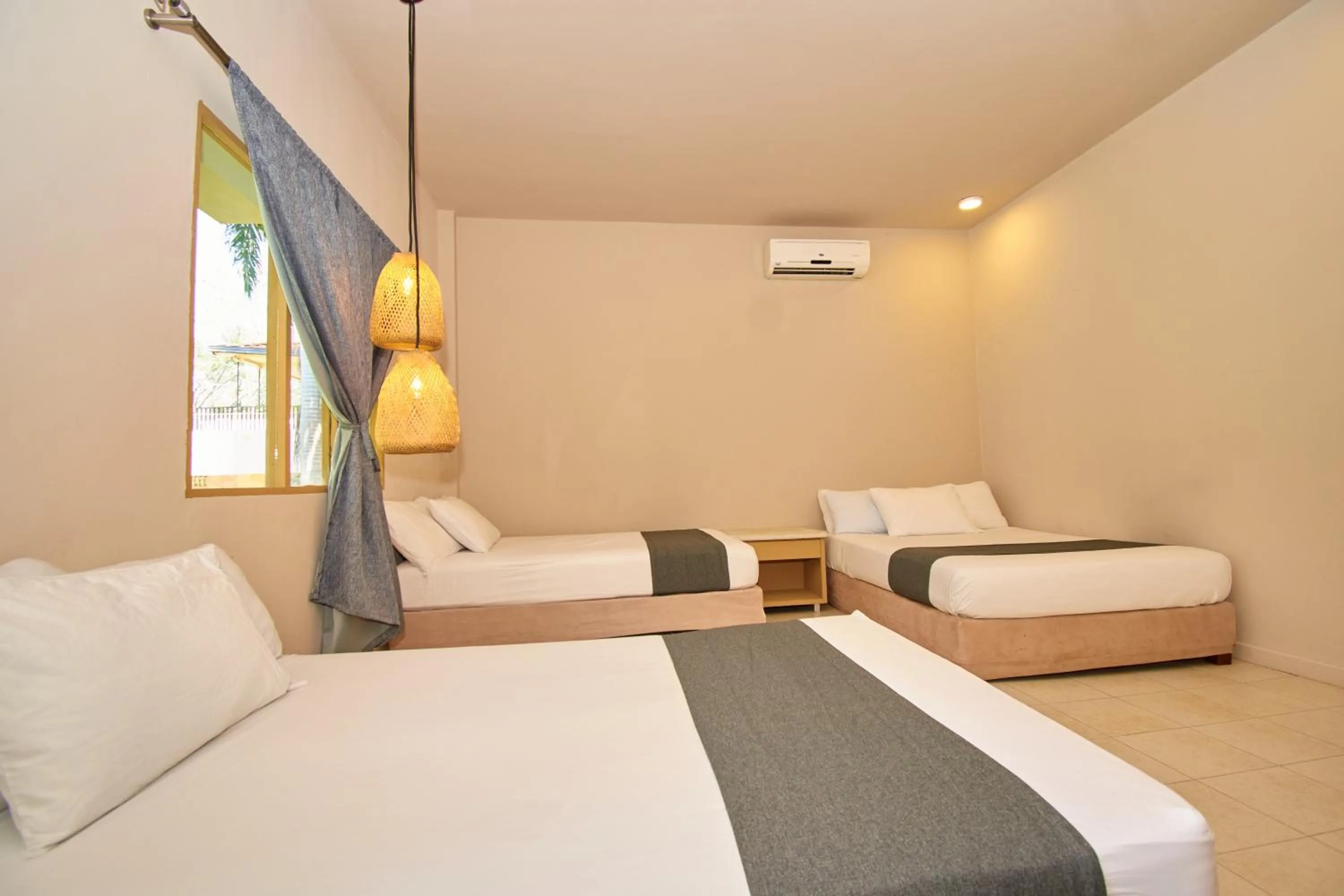 Bed in La Iguana de Santa Fe by Bernalo Hotels
