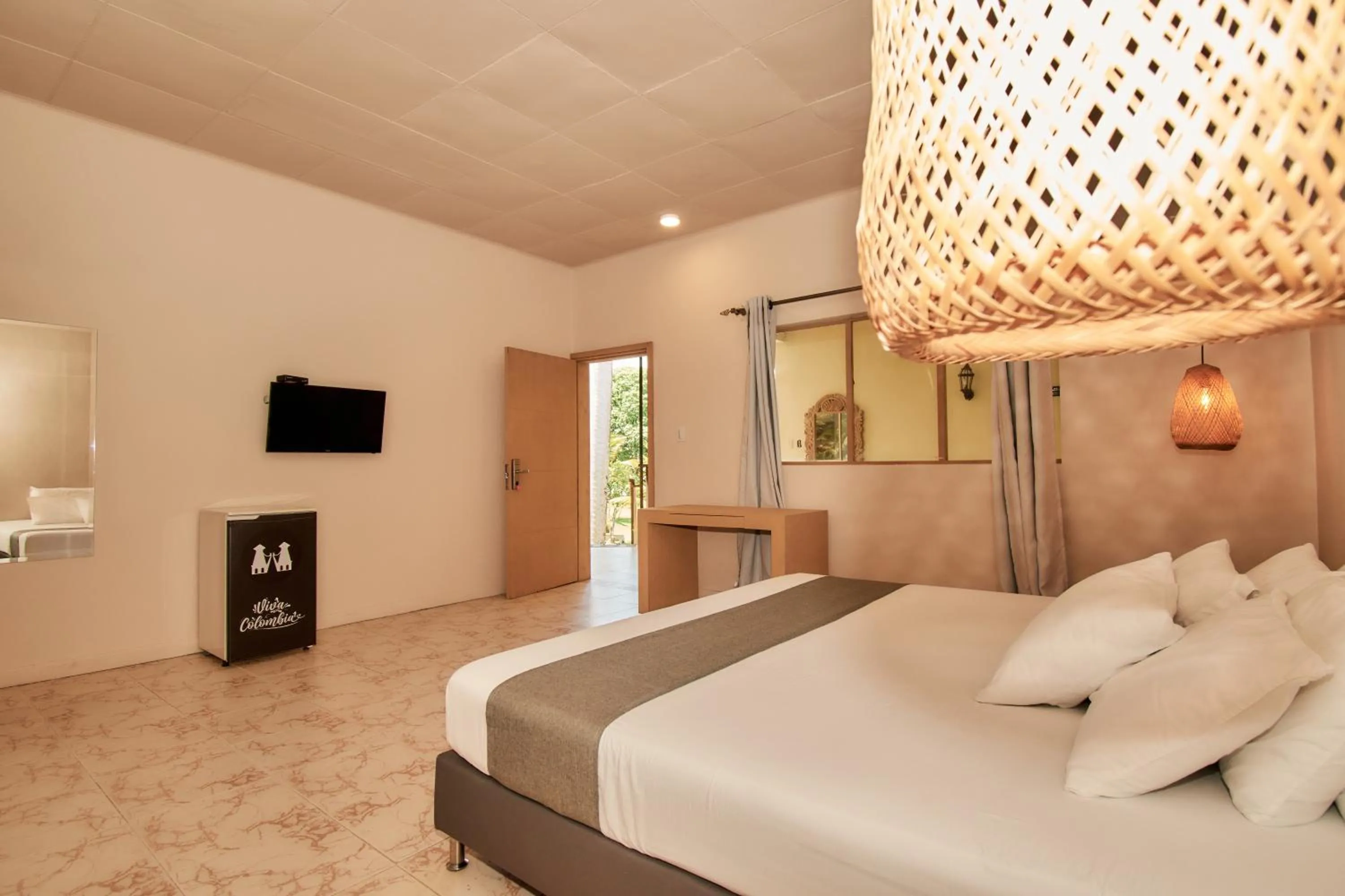 Bed in La Iguana de Santa Fe by Bernalo Hotels