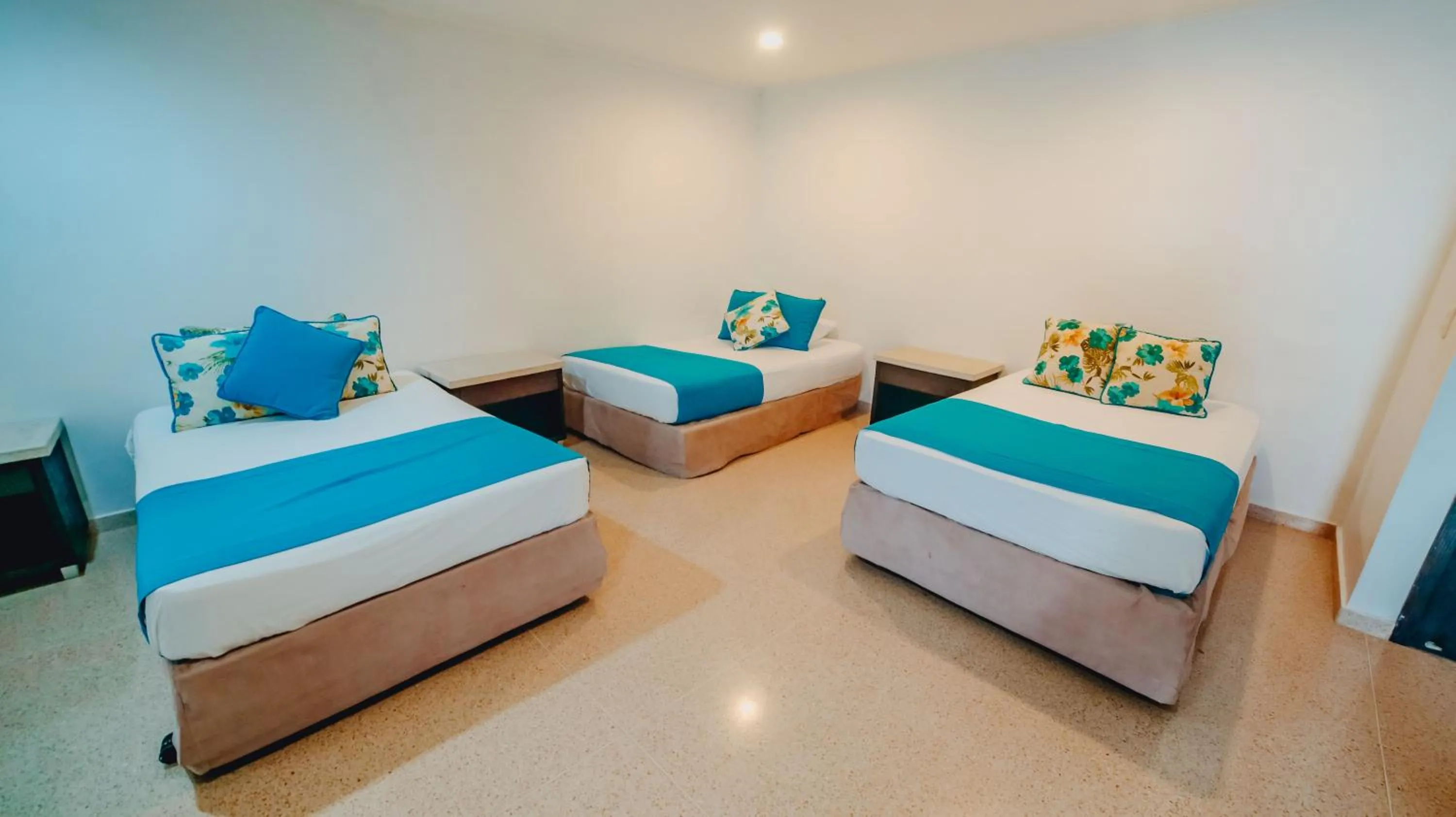 Bed in La Iguana de Santa Fe by Bernalo Hotels
