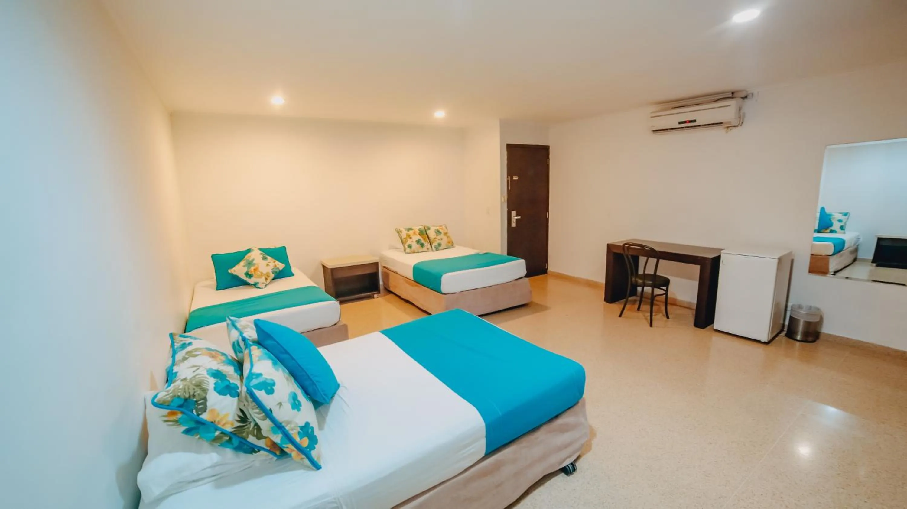 Bed in La Iguana de Santa Fe by Bernalo Hotels