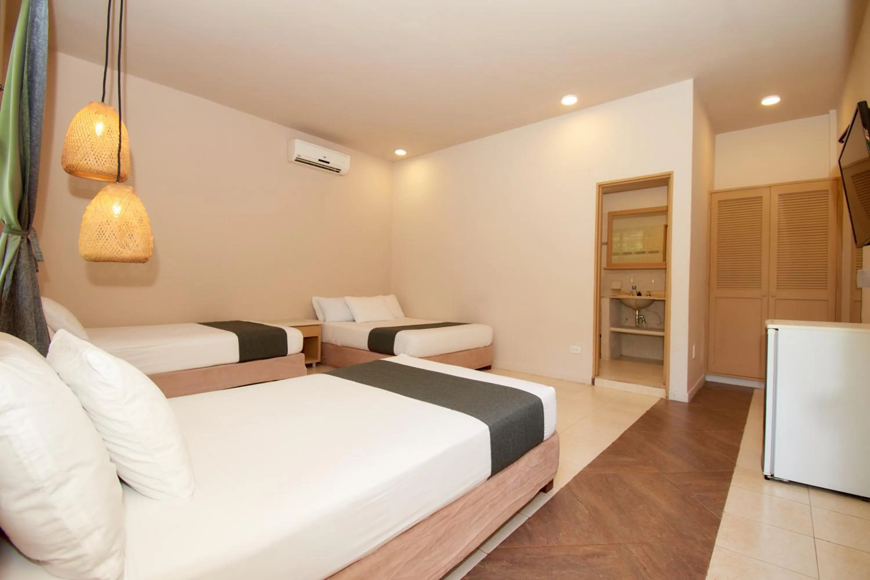 Bed in La Iguana de Santa Fe by Bernalo Hotels