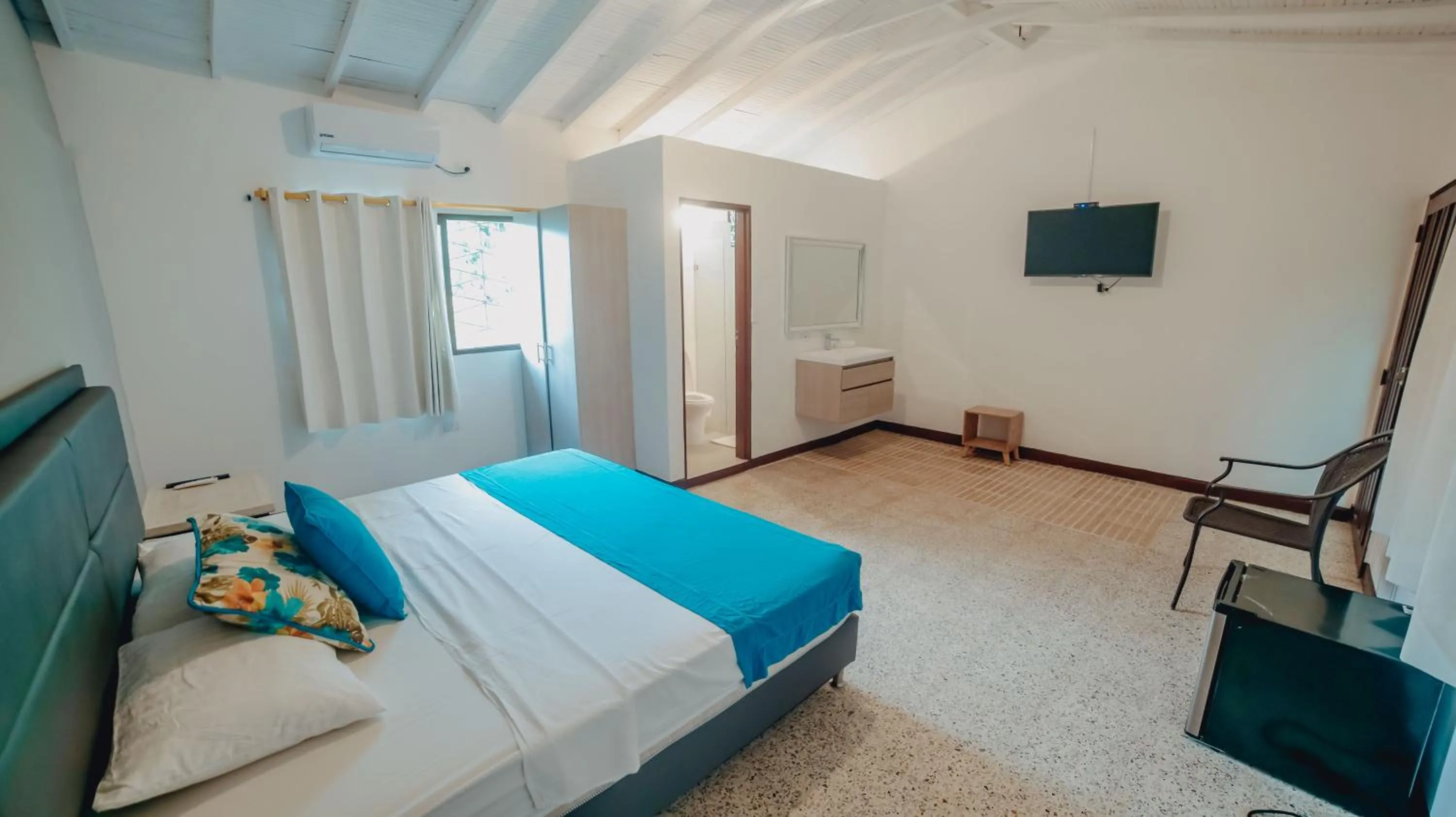 Bed in La Iguana de Santa Fe by Bernalo Hotels