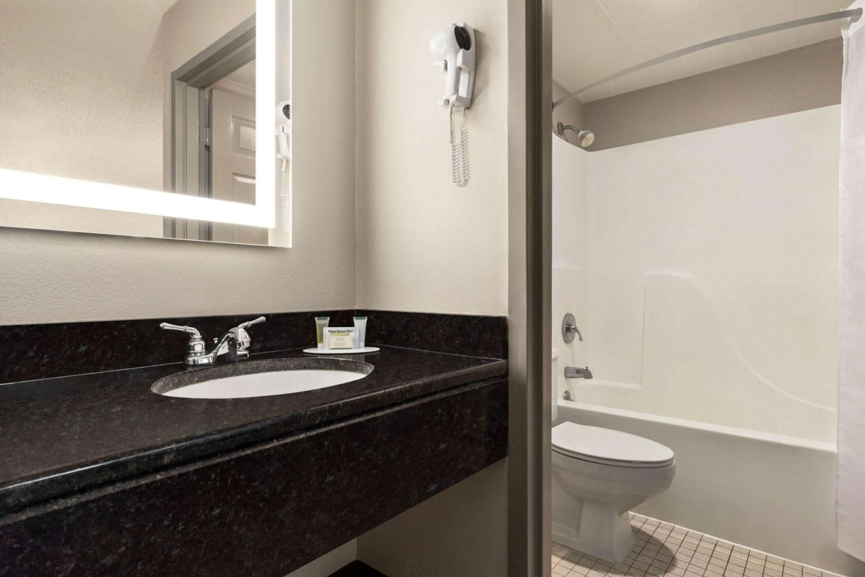 Bathroom in Days Inn by Wyndham Kuttawa/Eddyville