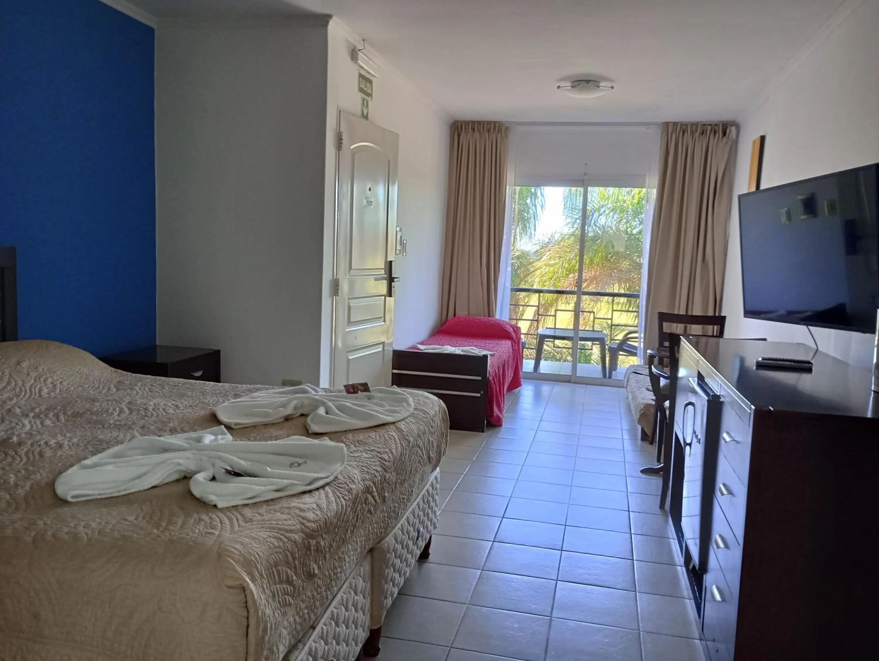 Bed in Brisas del Lago Apart y Hotel