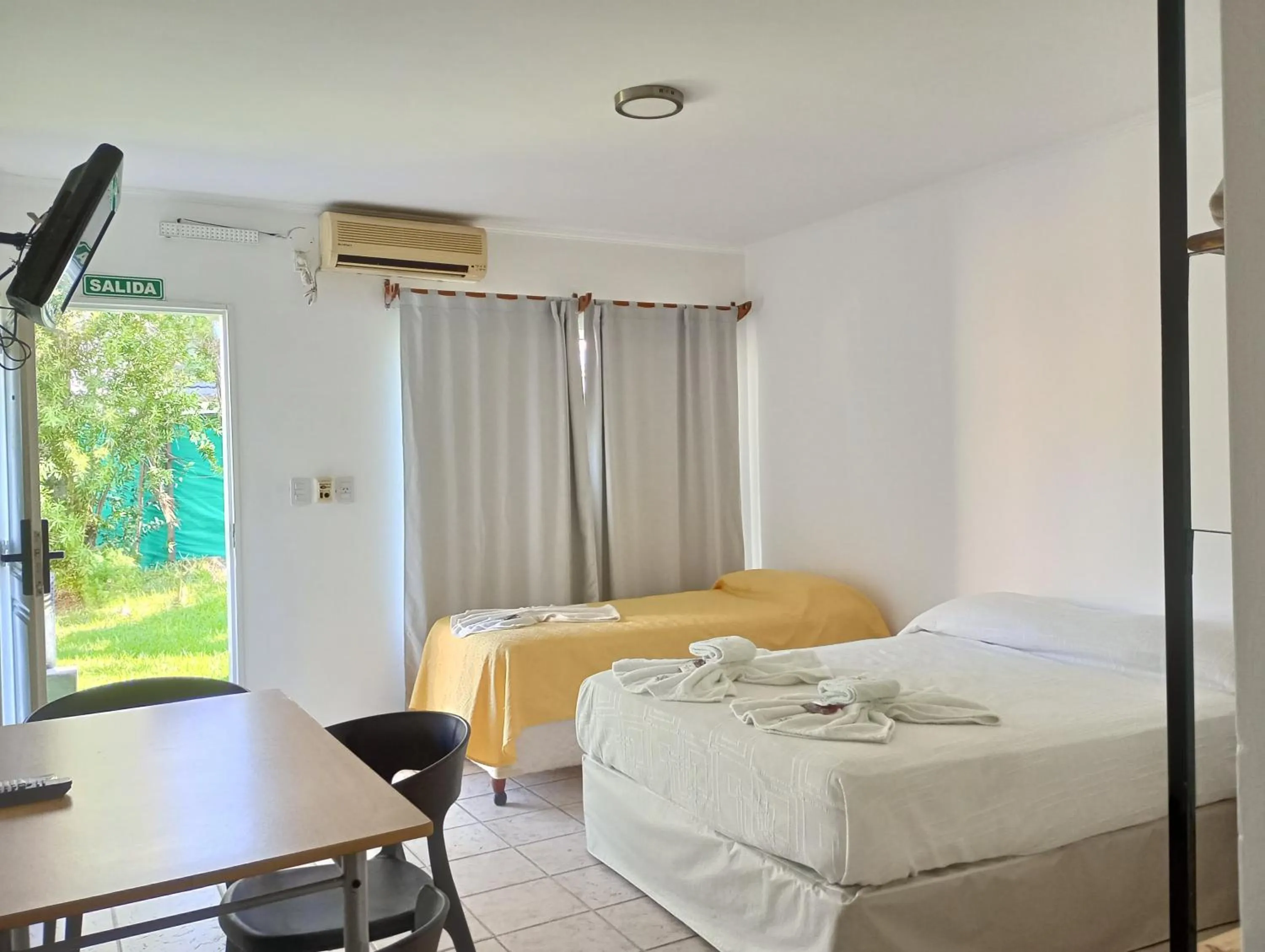 Bed in Brisas del Lago Apart y Hotel