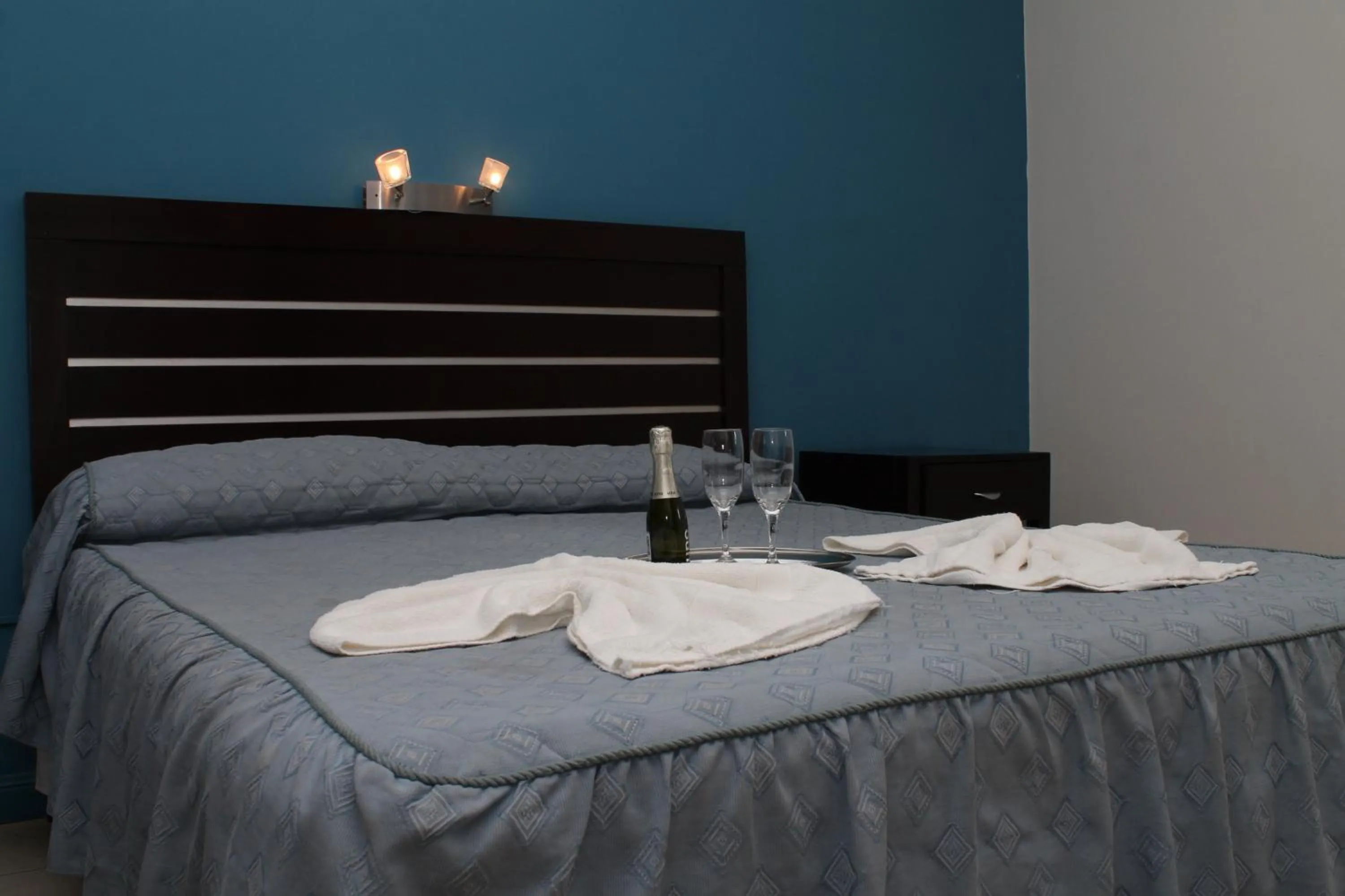 Bed in Brisas del Lago Apart y Hotel