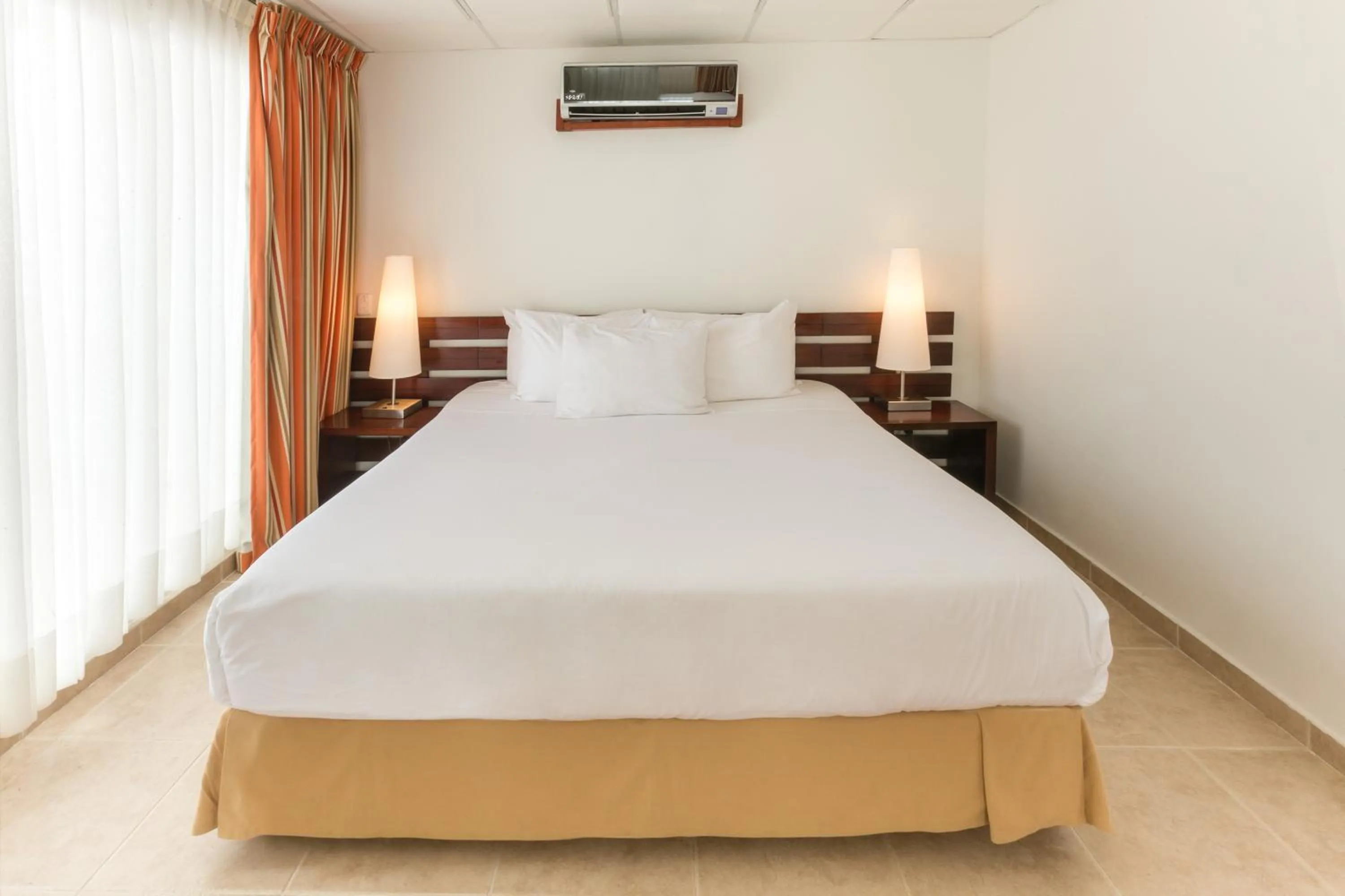 Bed in Decameron Los Delfines - All Inclusive