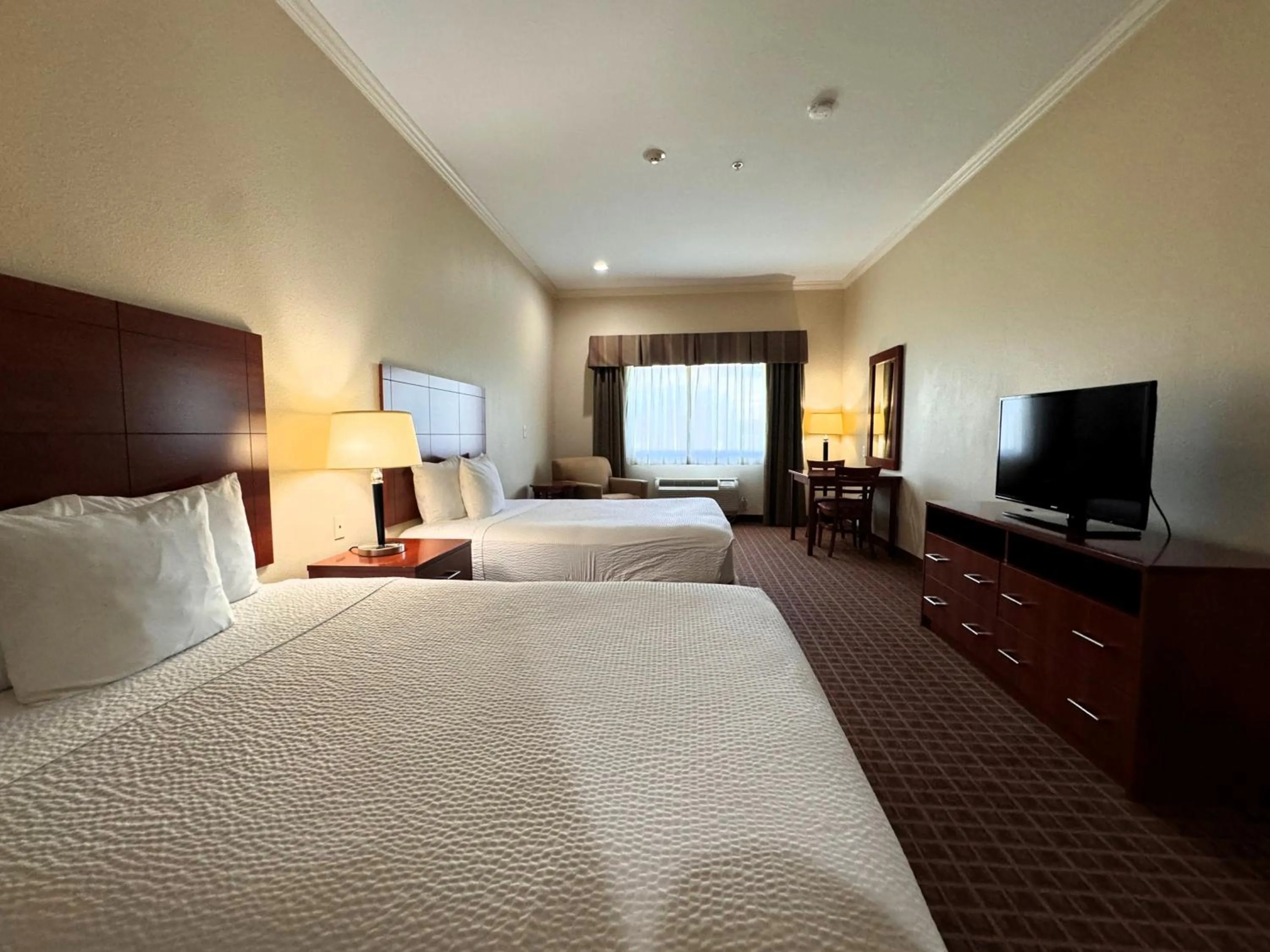 Photo of the whole room, Bed in Ramada by Wyndham College Station