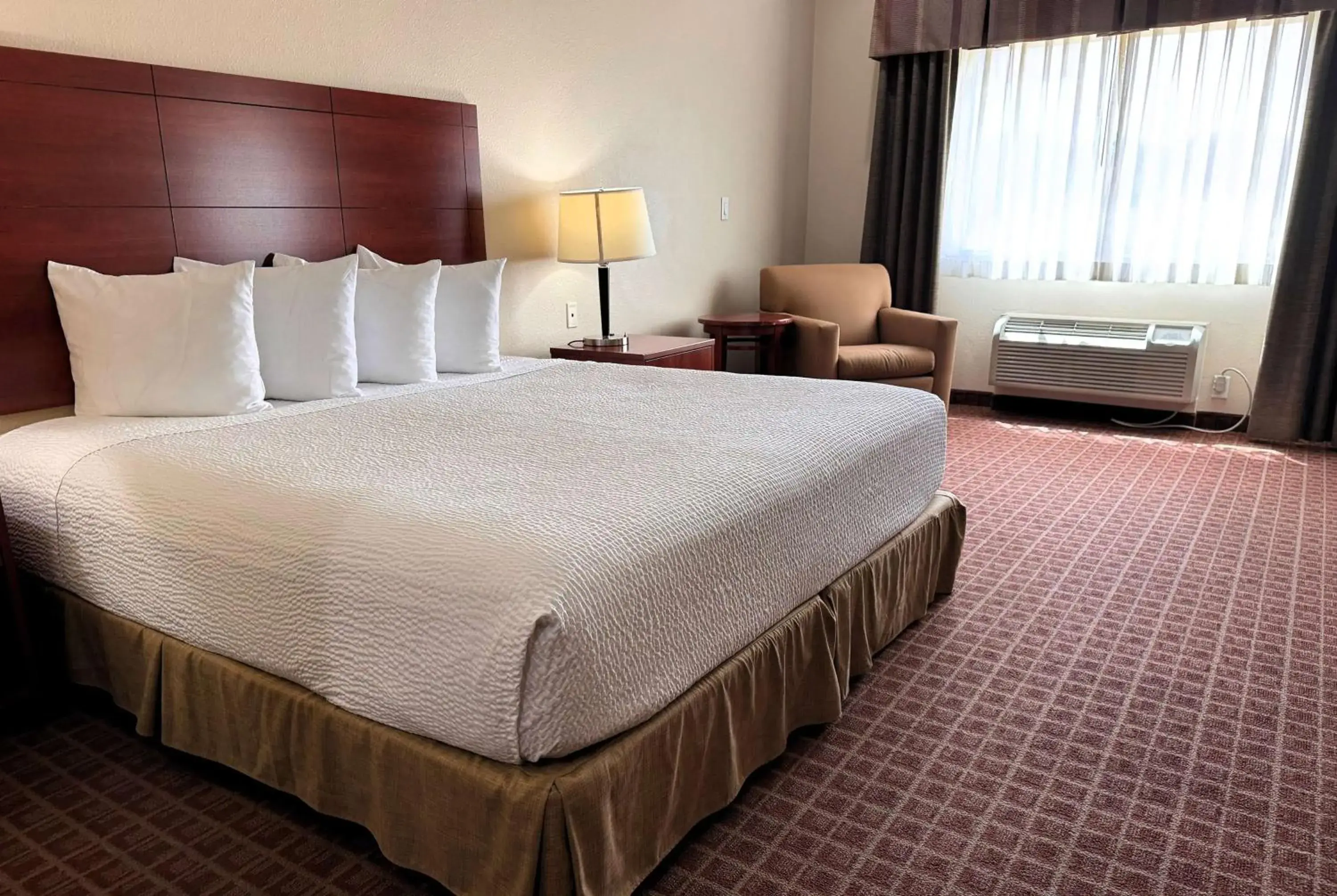 Photo of the whole room, Bed in Ramada by Wyndham College Station Photo of the whole room, Bed in Ramada by Wyndham College Station