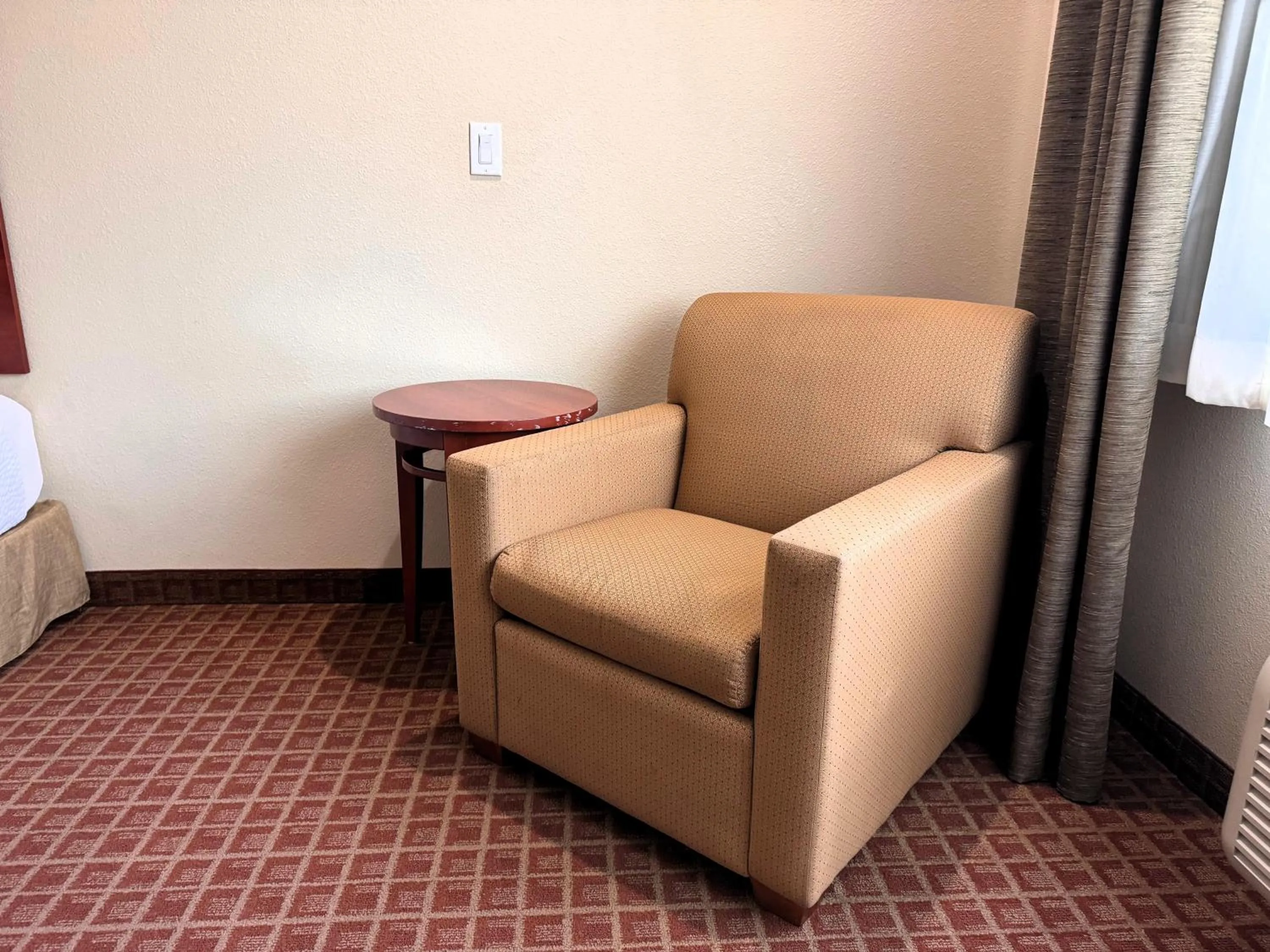 Seating area in Ramada by Wyndham College Station