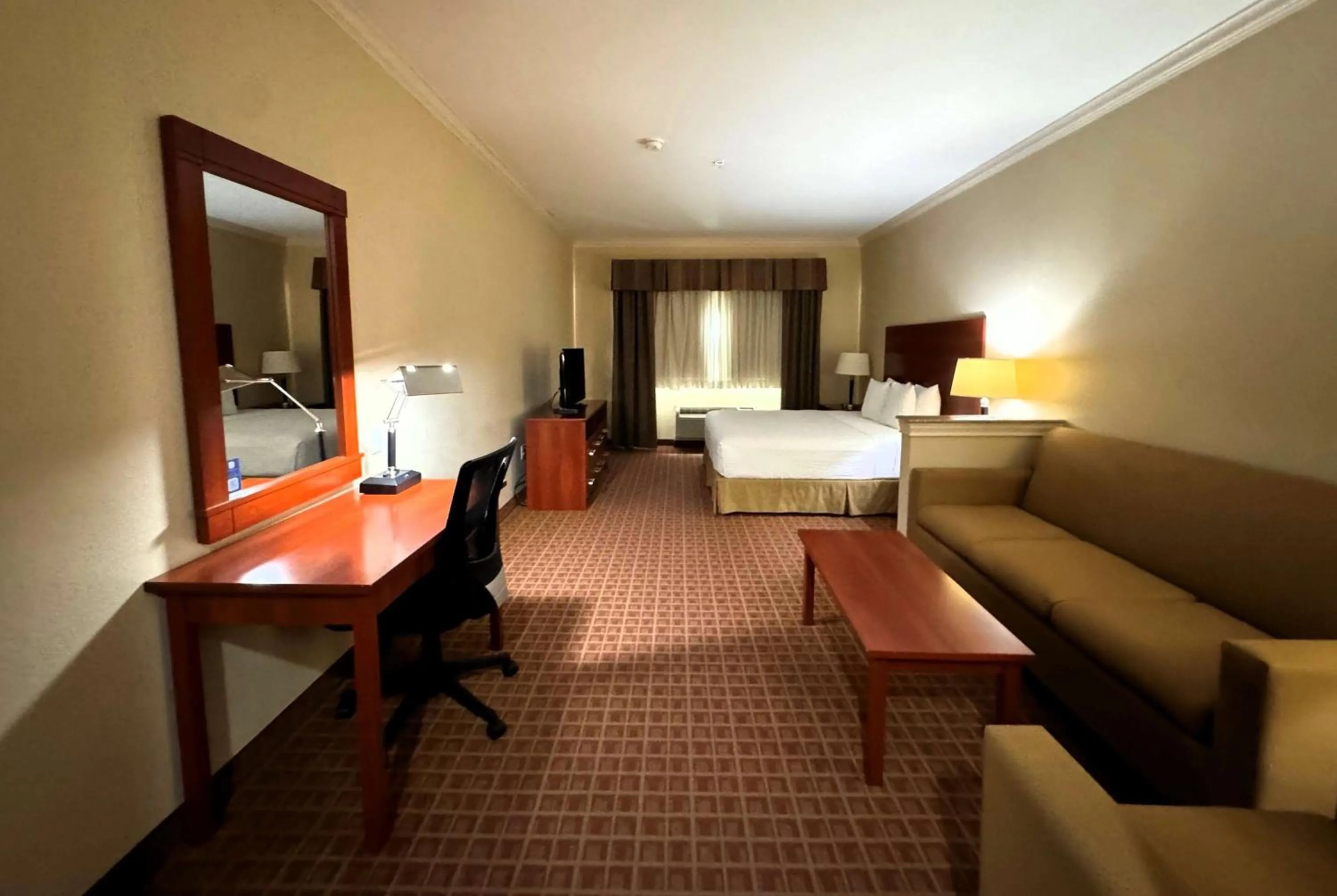 Photo of the whole room, Bed in Ramada by Wyndham College Station