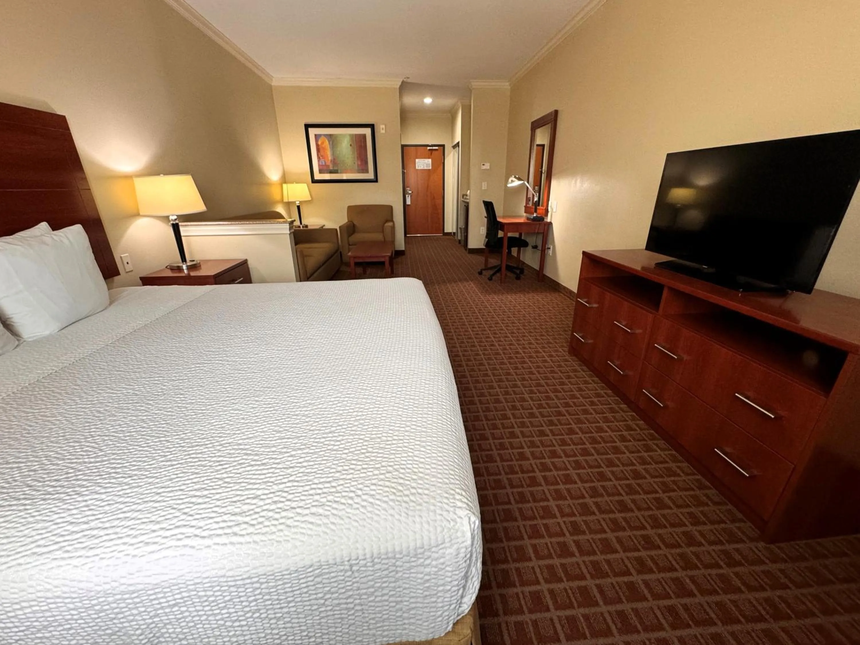 Photo of the whole room, Bed in Ramada by Wyndham College Station