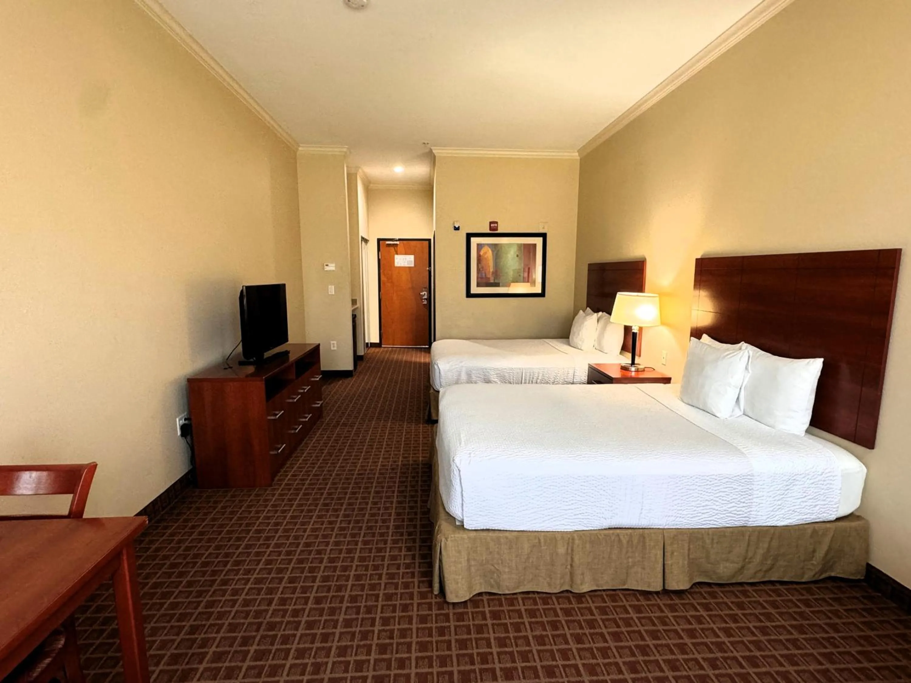 Photo of the whole room, Bed in Ramada by Wyndham College Station