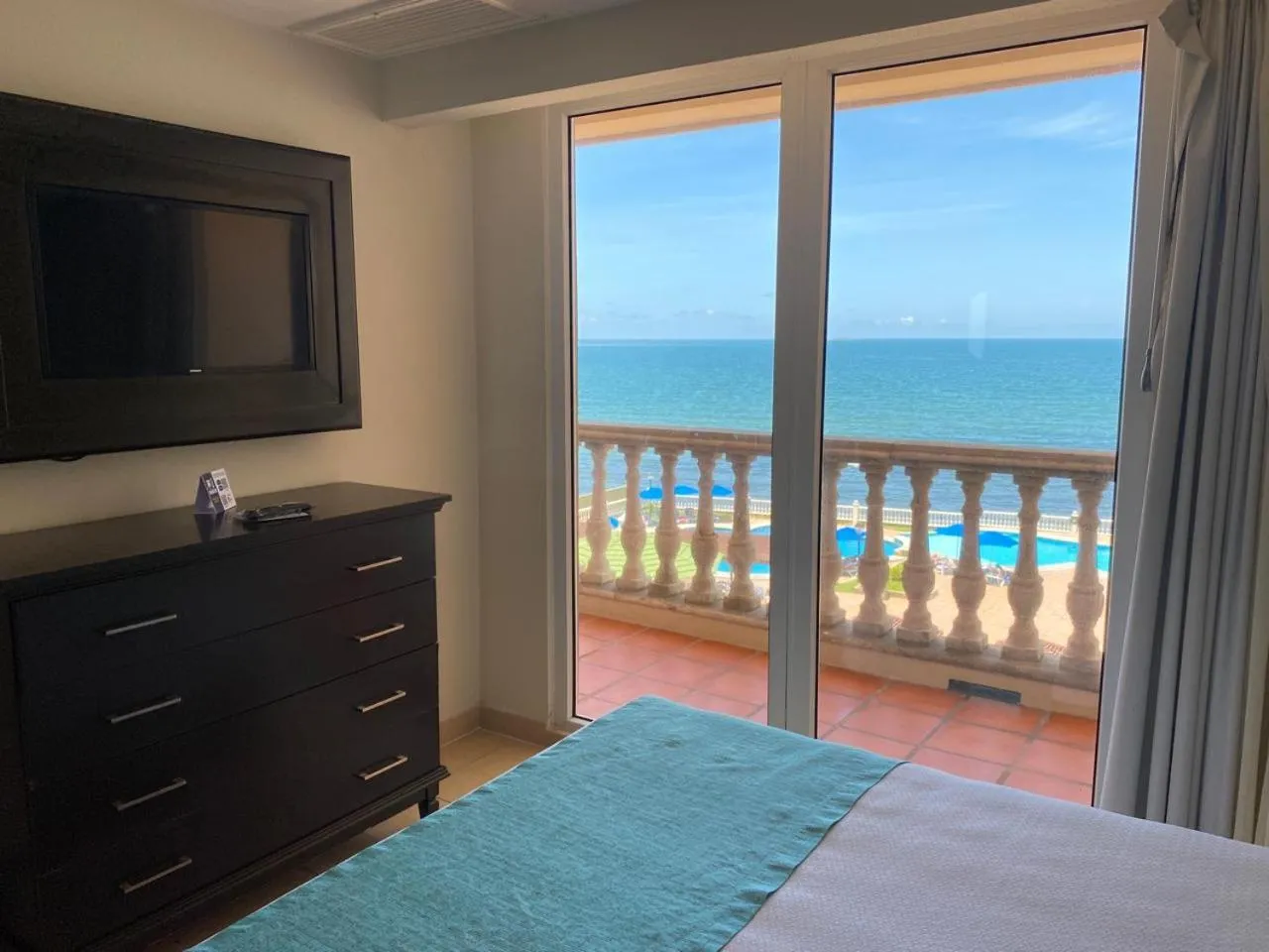 Balcony/Terrace, Bed in Astur Hotel & Residence