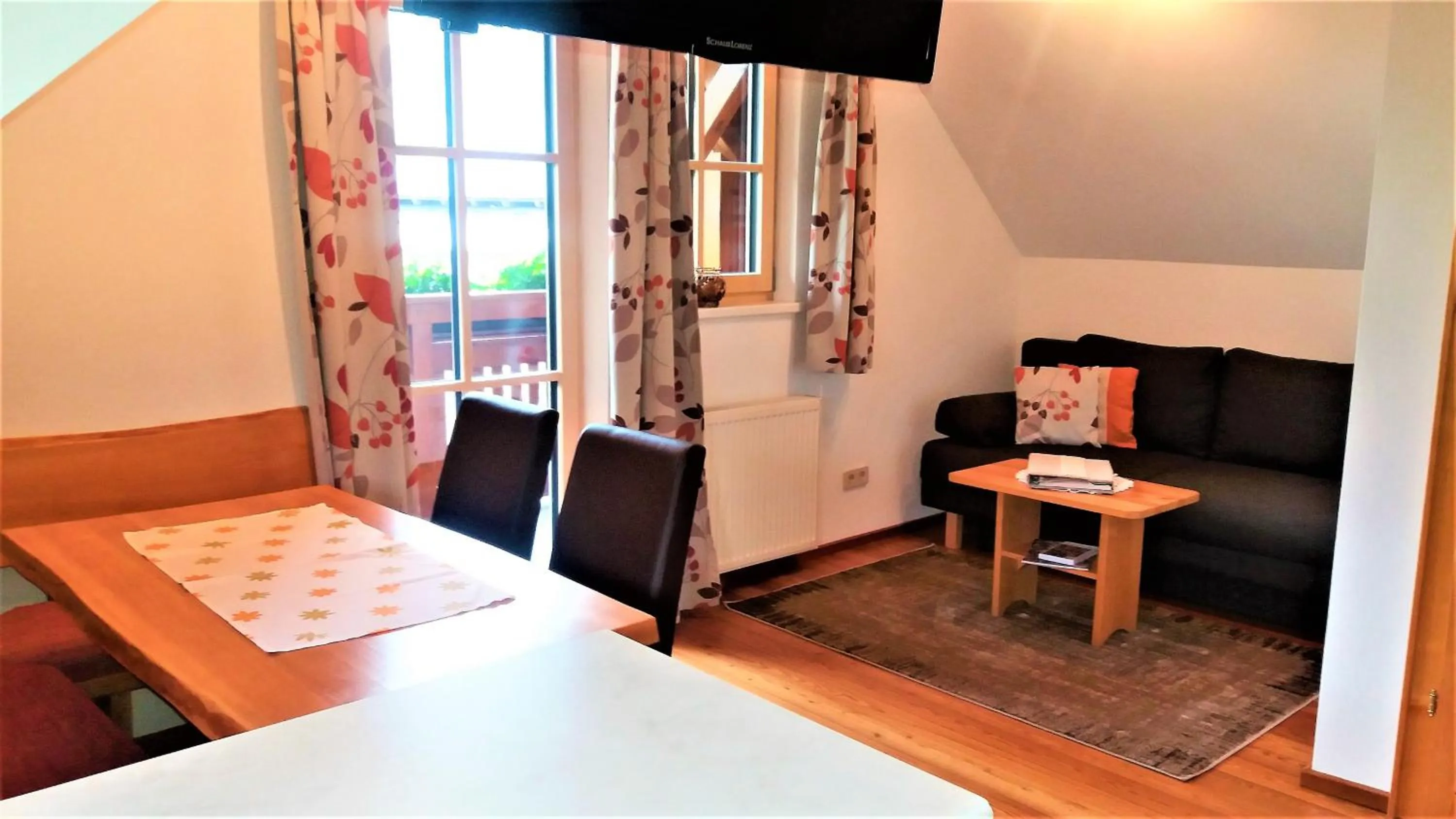 Communal lounge/ TV room, Bed in Ferienwohnungen Simonbauer