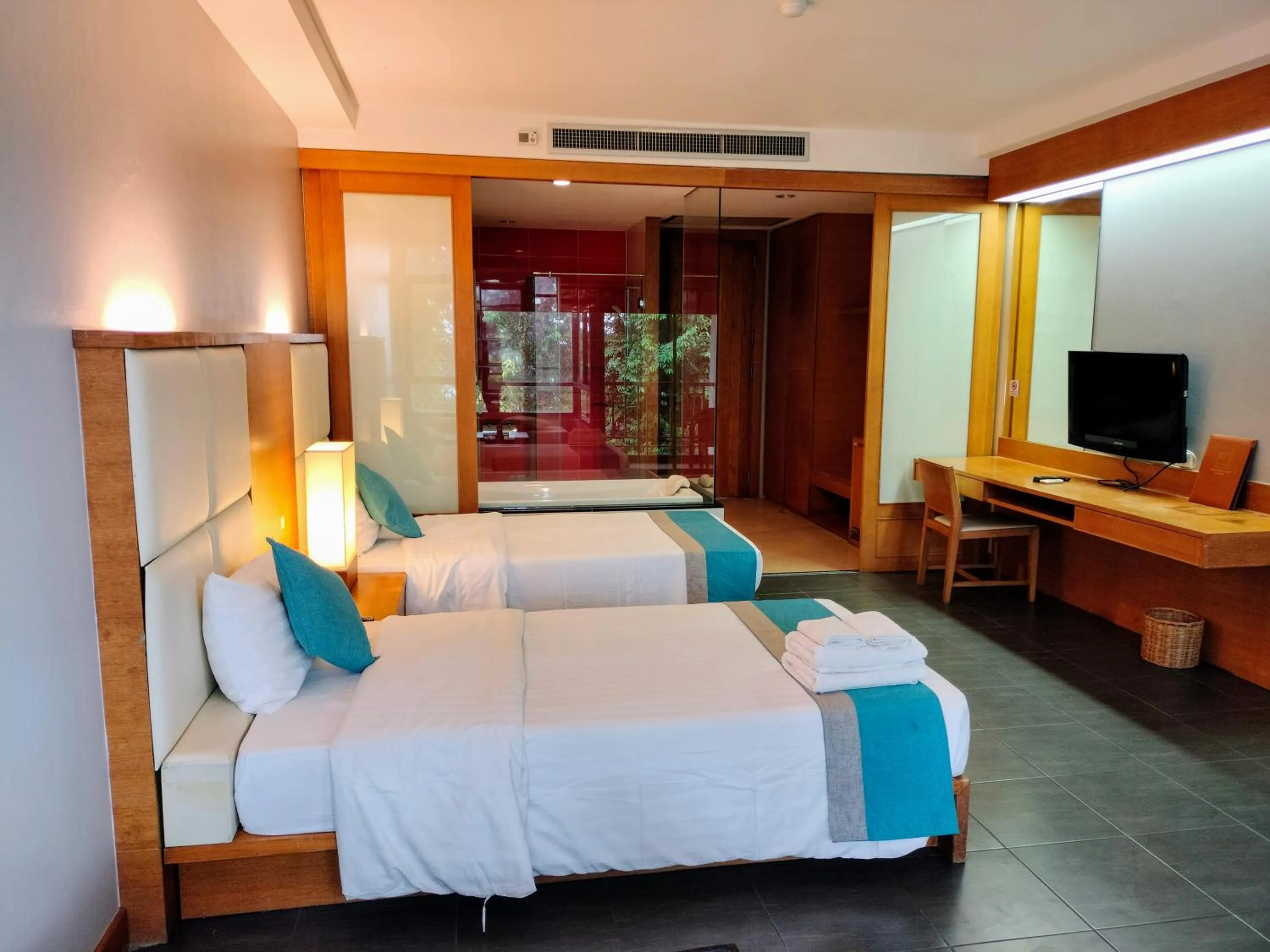 Bed in Chang Buri Resort & Koh Chang Hillside