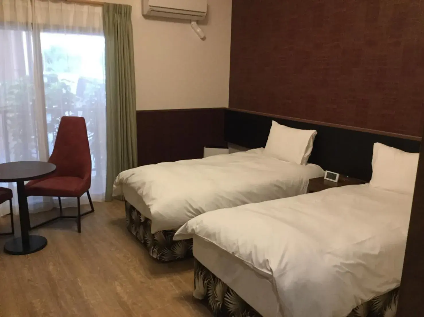 Bed in Seaside Hotel The Beach Bed in Seaside Hotel The Beach