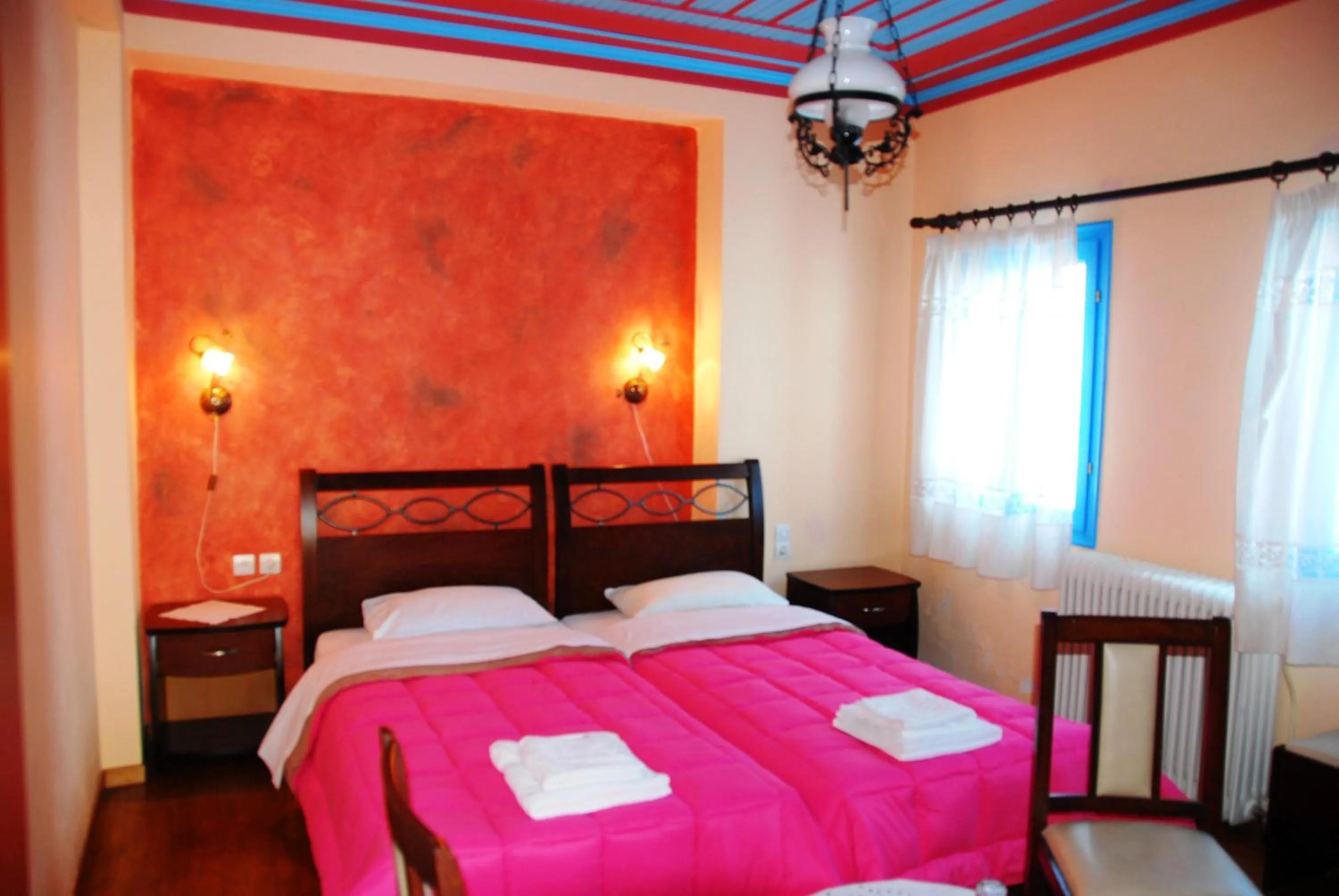 Bed in Hotel Ladias