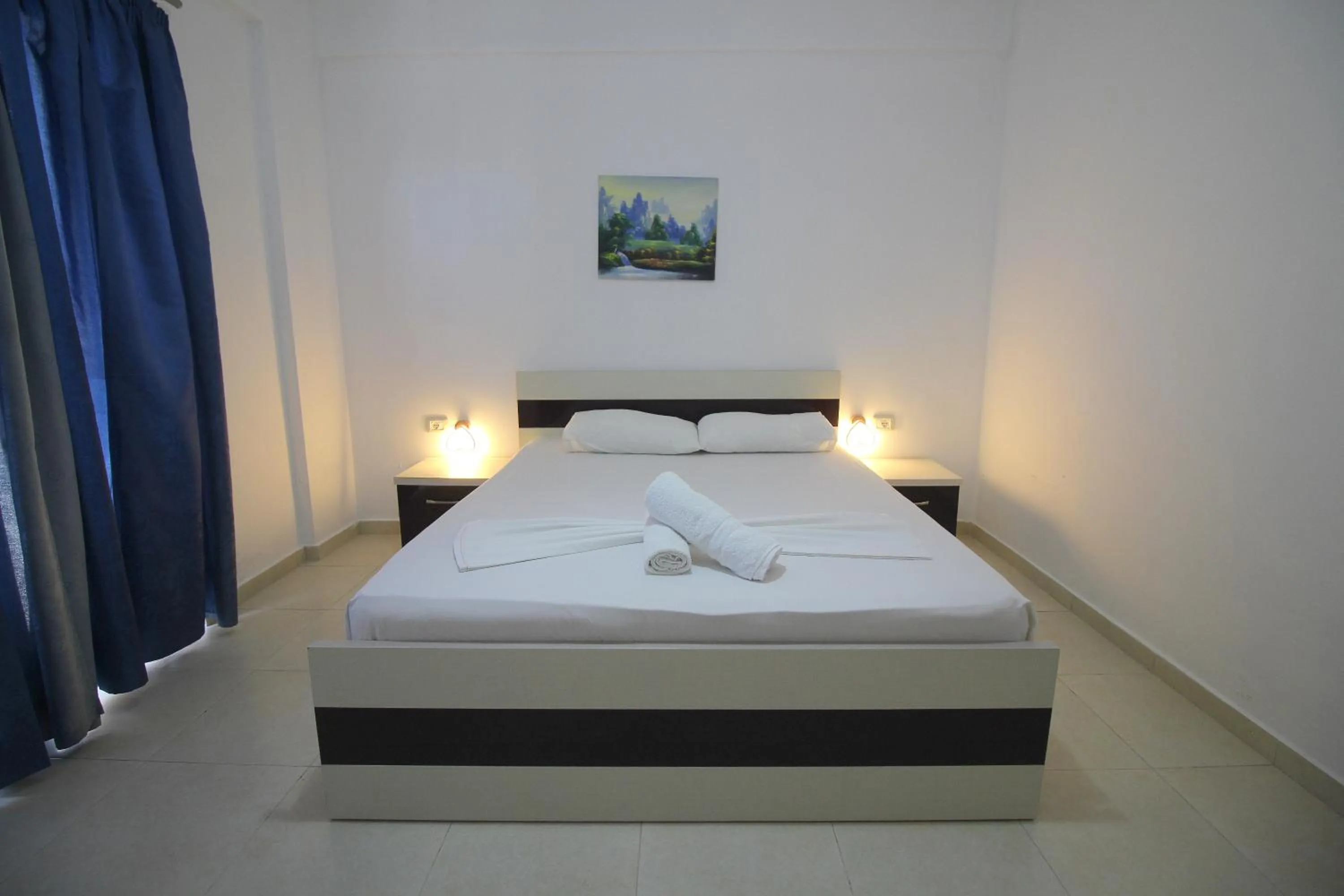 towels, Bed in Hotel Argjiro