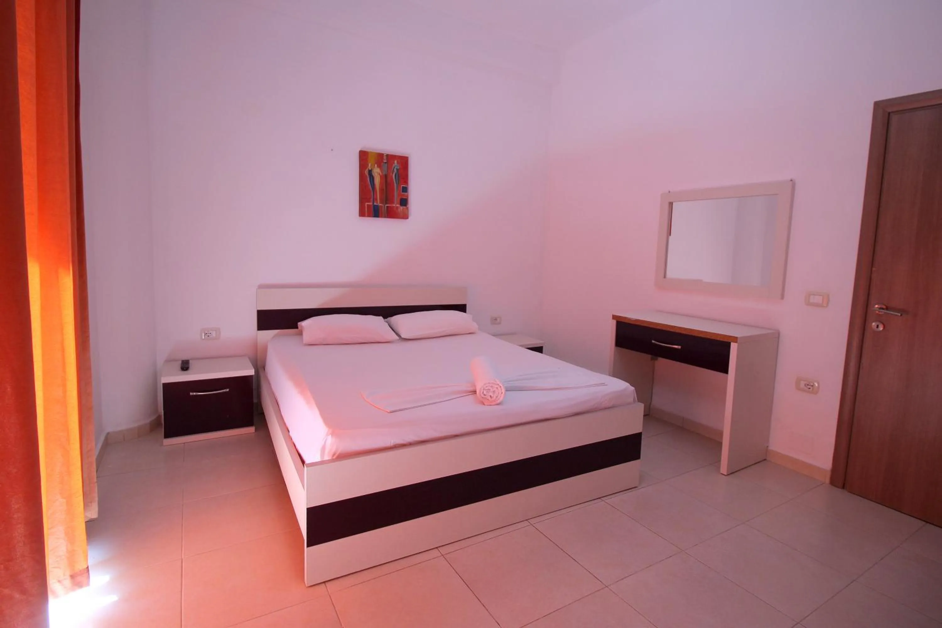 Bed in Hotel Argjiro