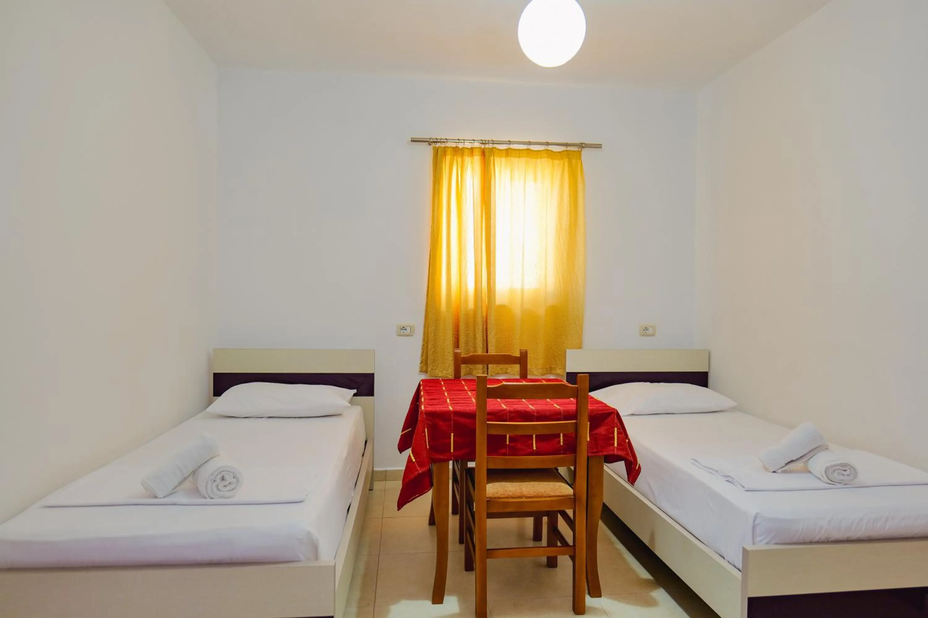 Bed in Hotel Argjiro