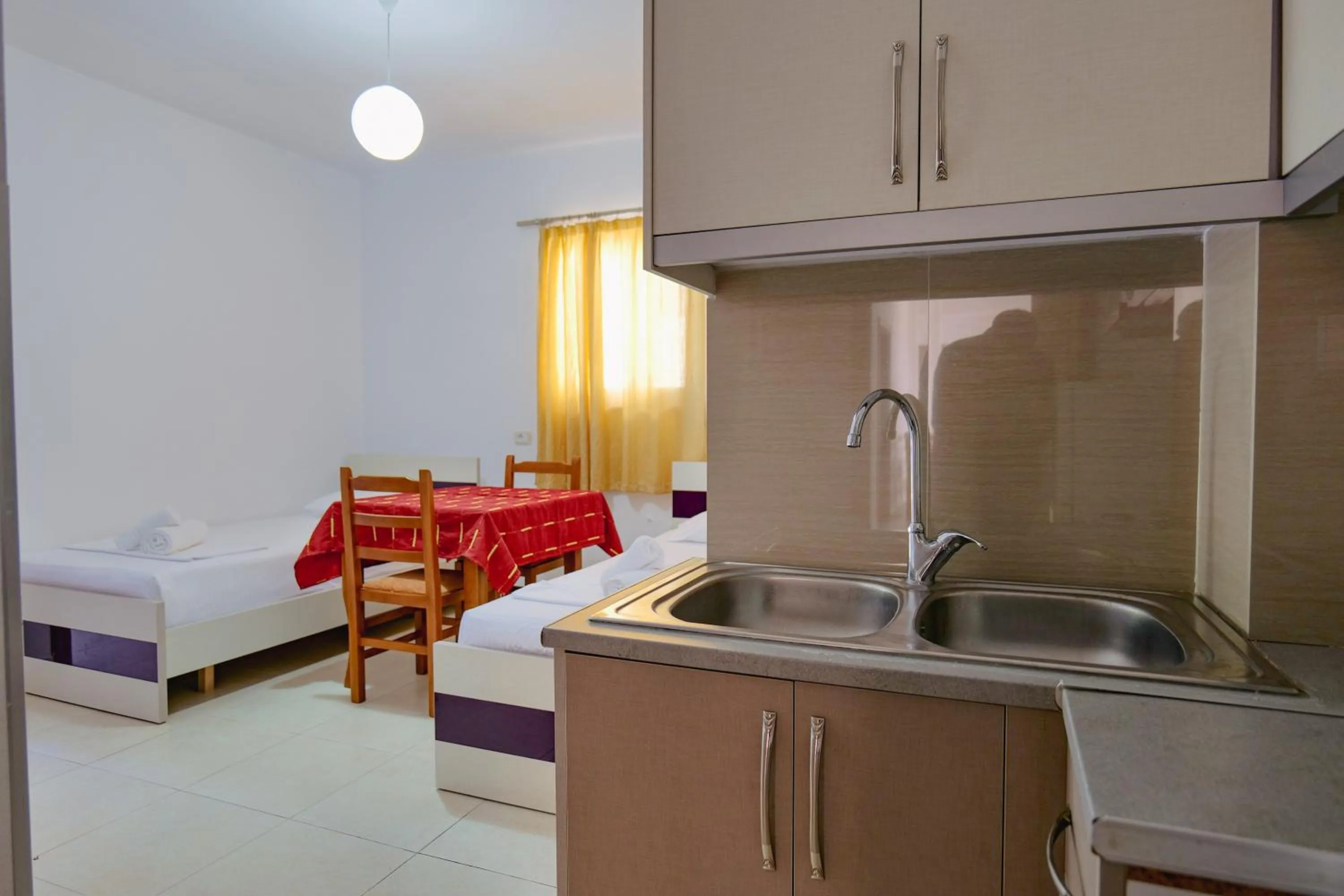 Bed in Hotel Argjiro