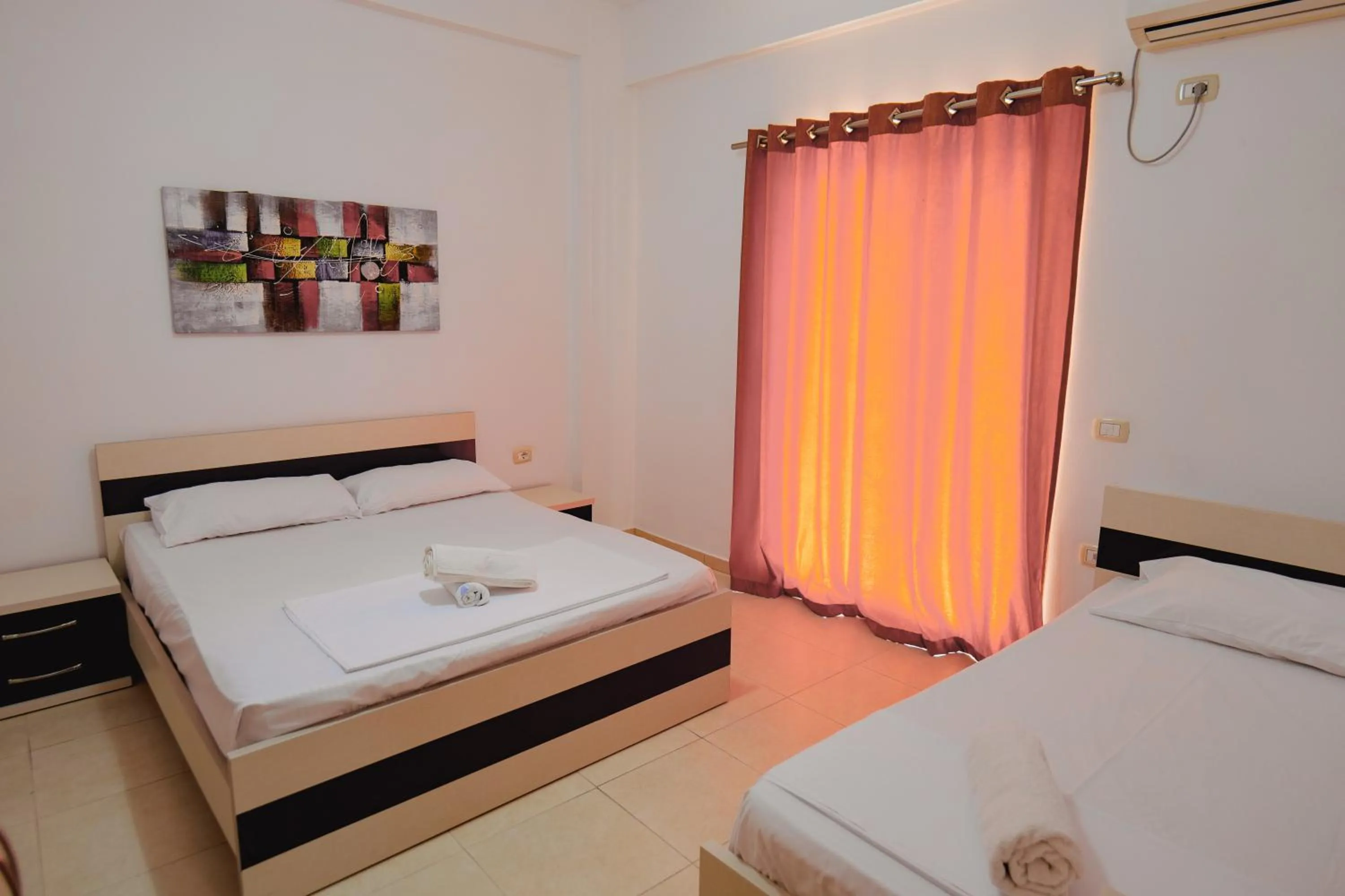 Bed in Hotel Argjiro