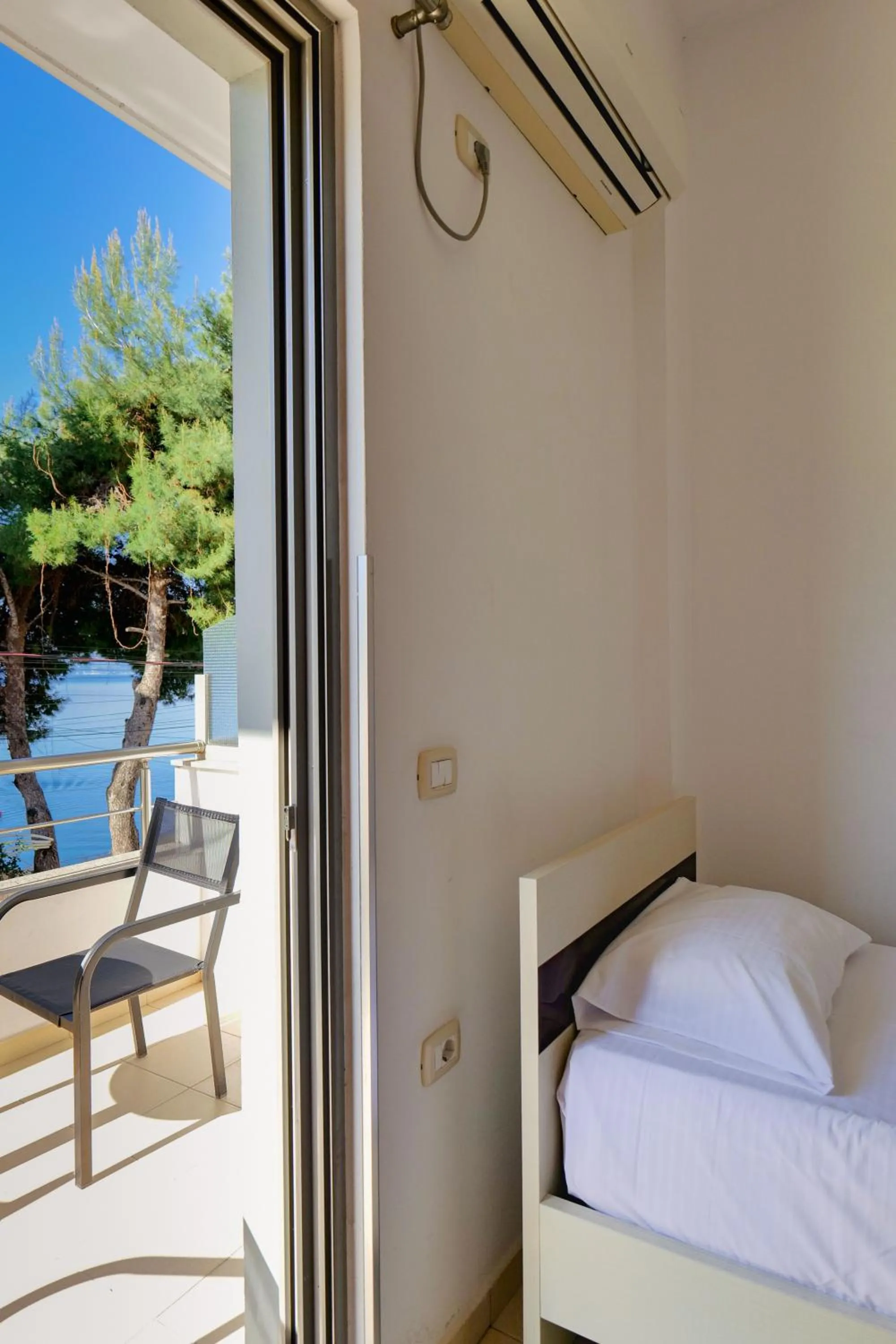 Bed in Hotel Argjiro