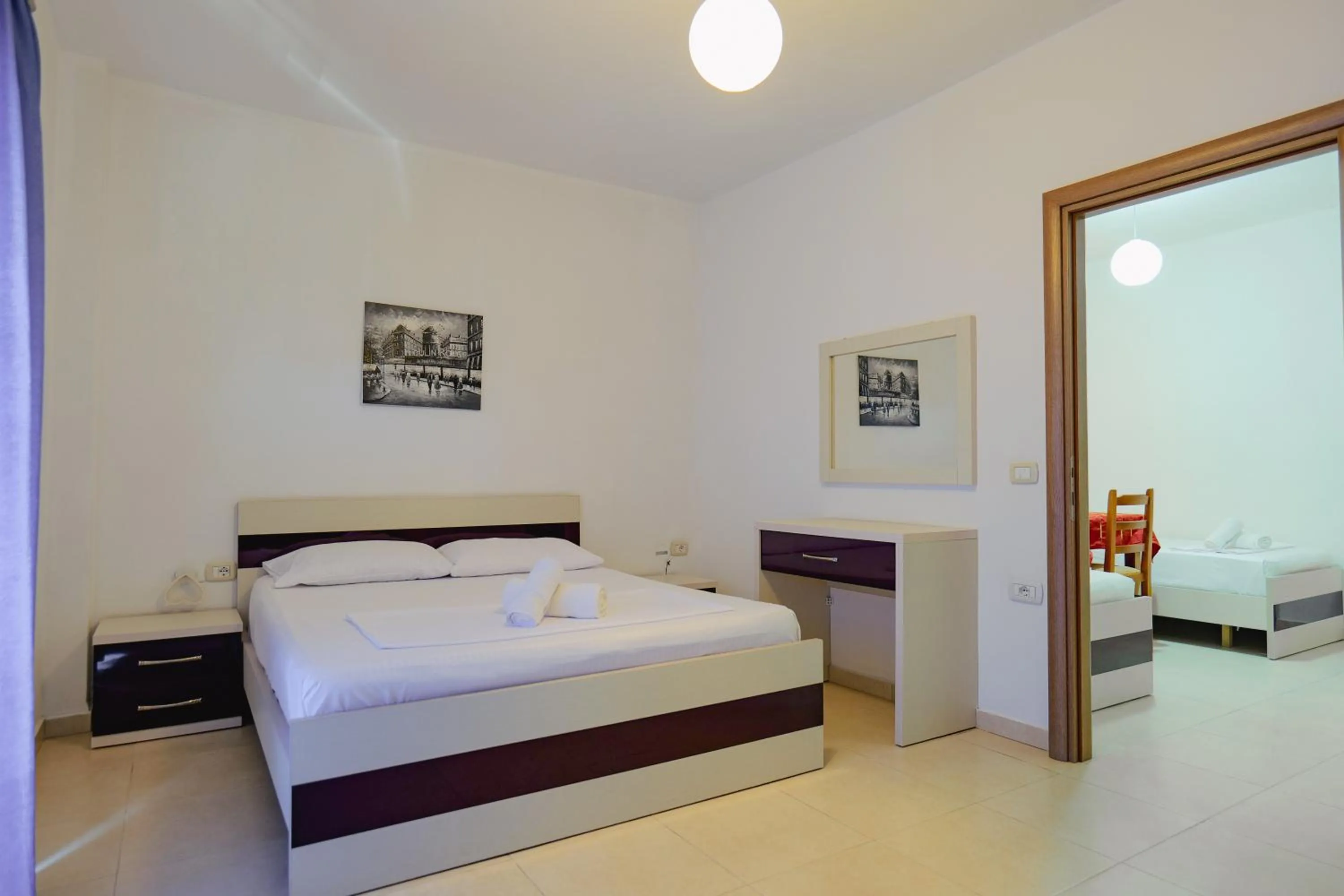 Bed in Hotel Argjiro