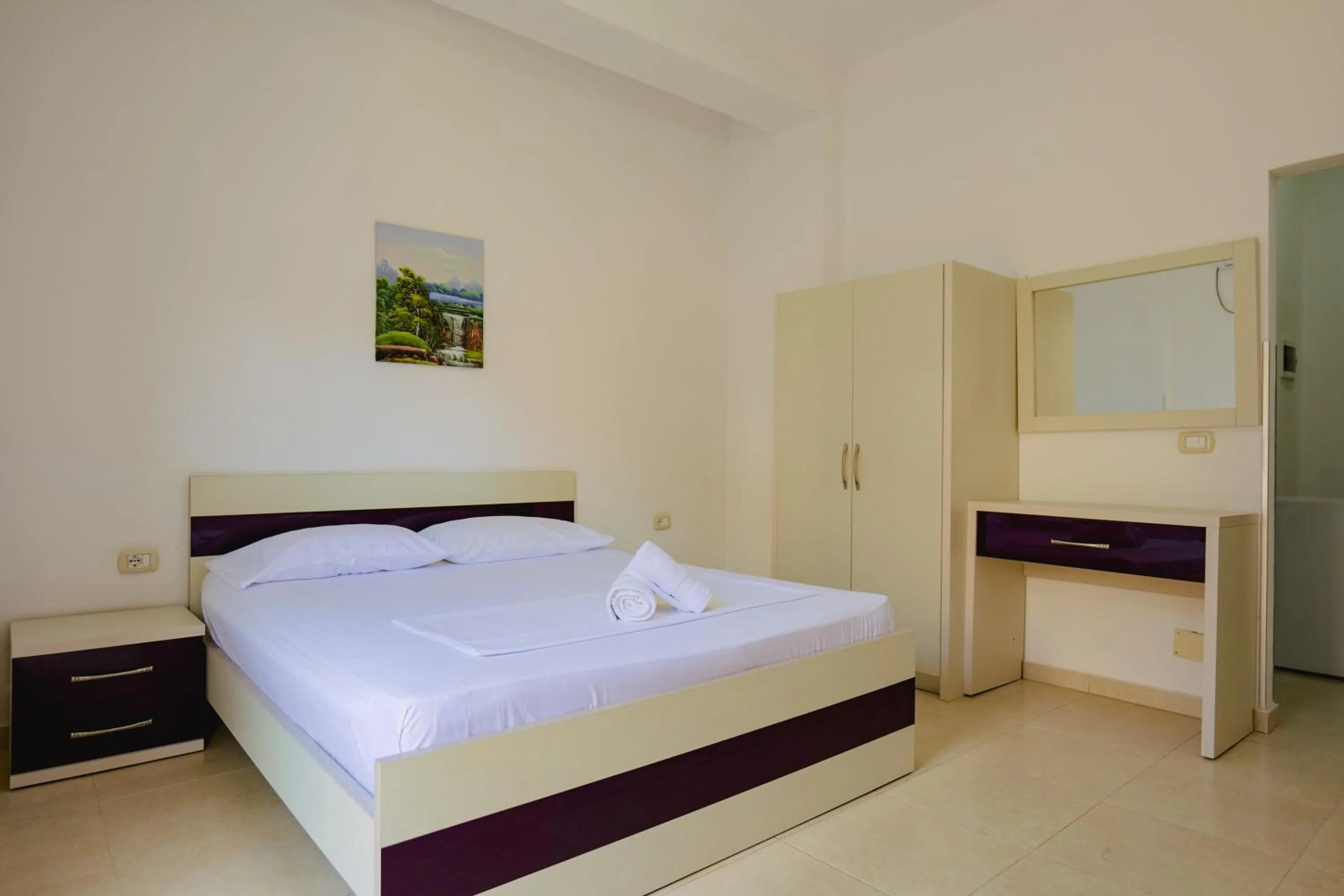 Bed in Hotel Argjiro