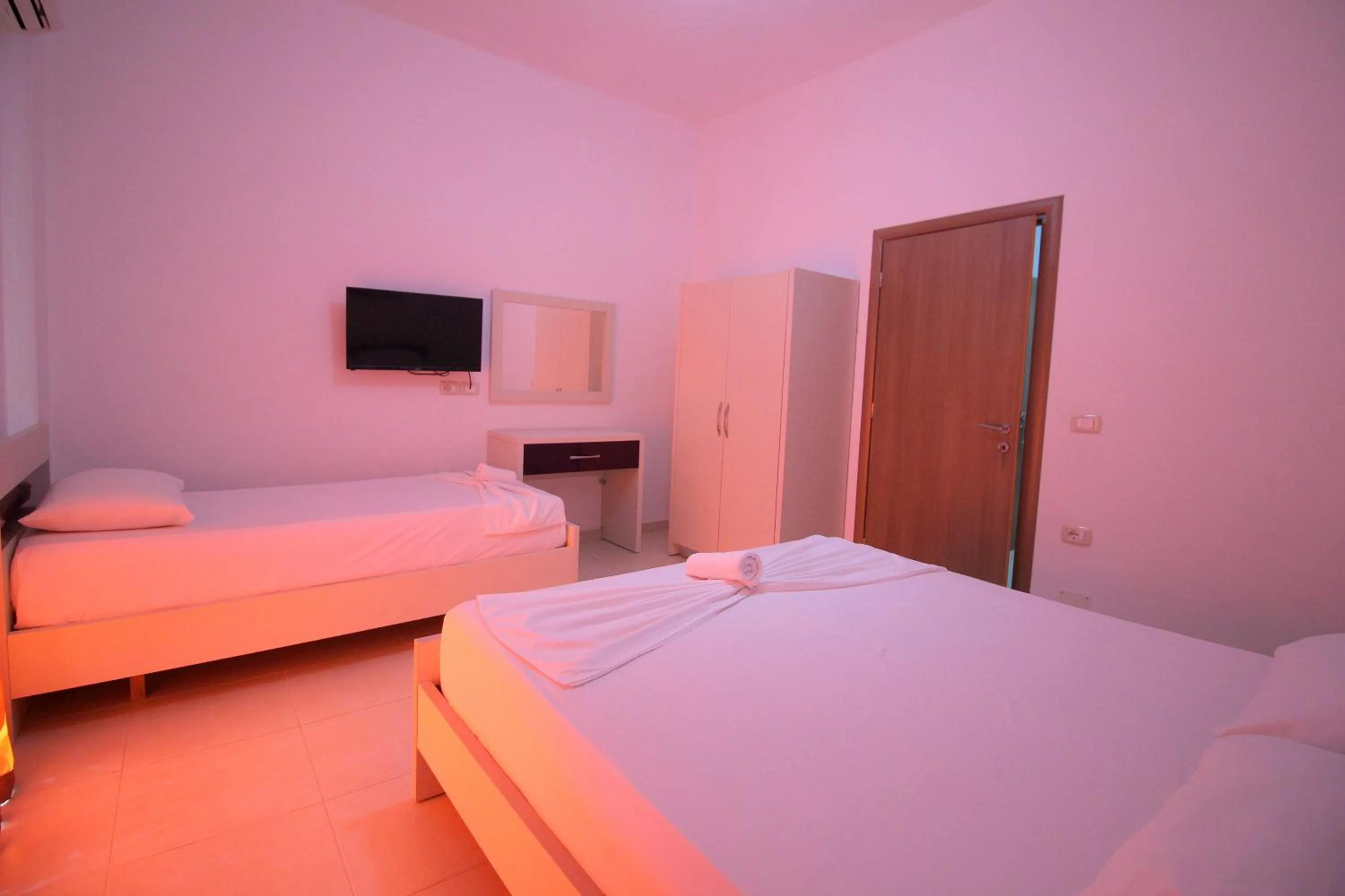 Bed in Hotel Argjiro