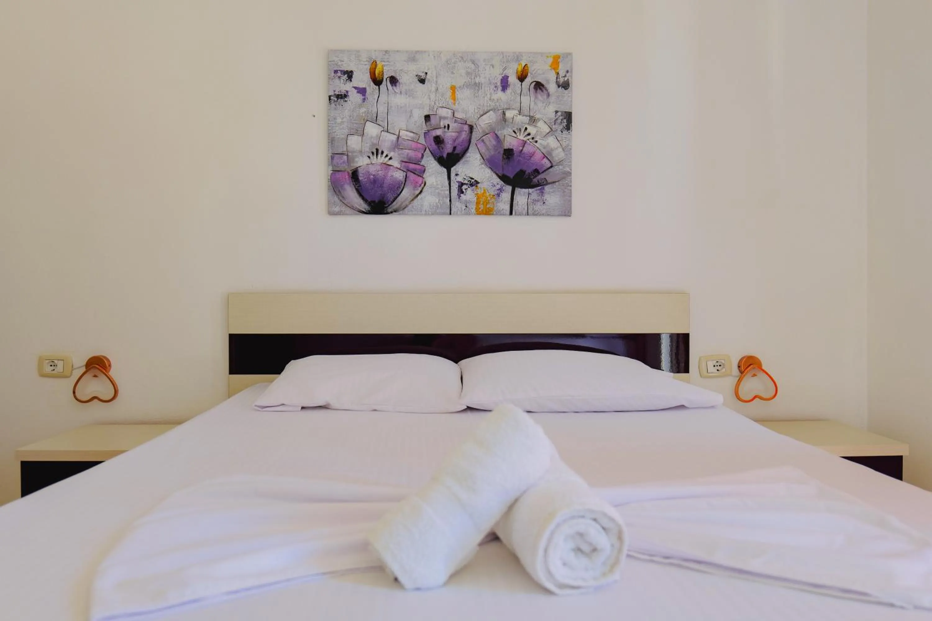 Bed in Hotel Argjiro