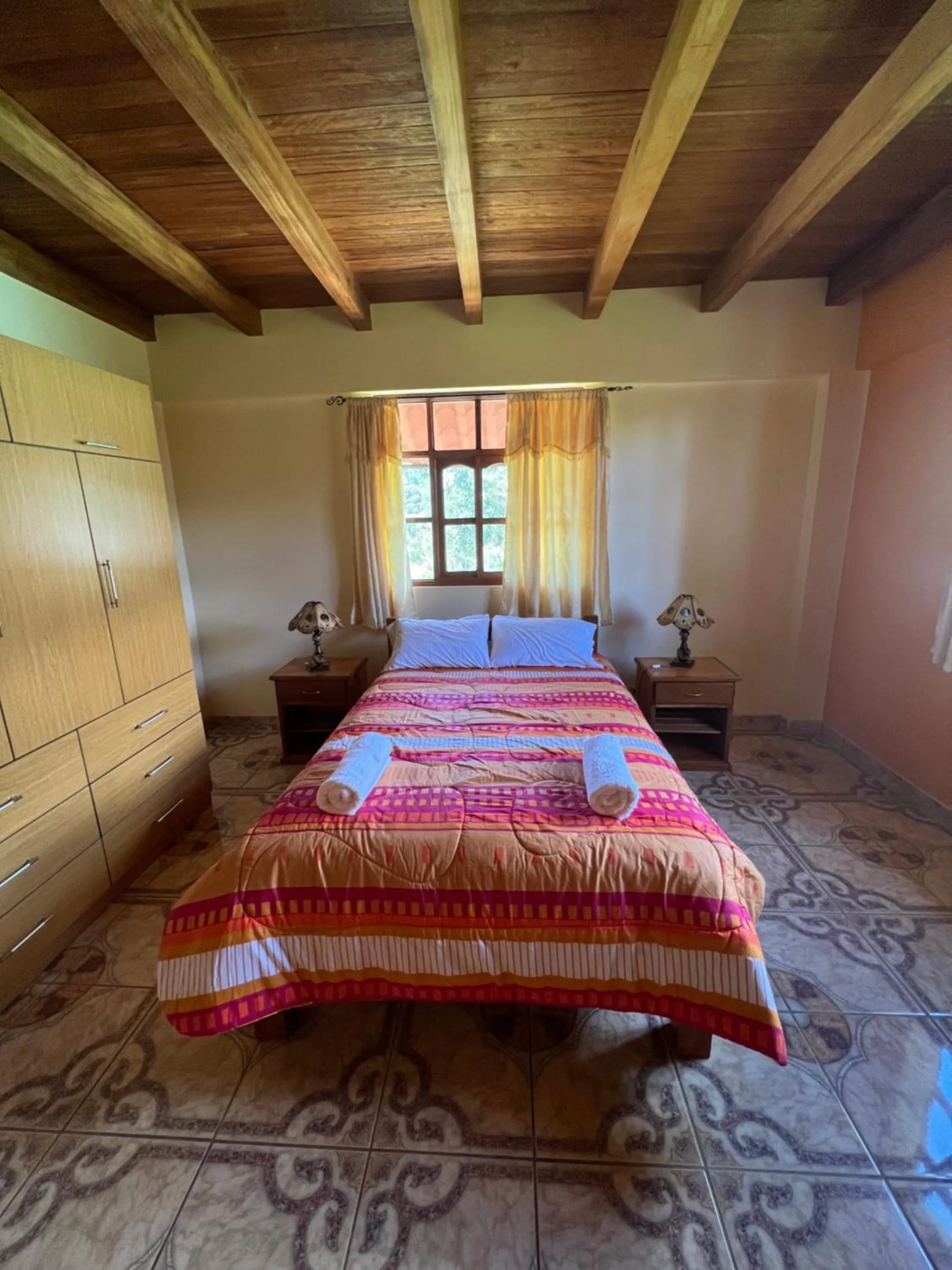 Bed in Lodge Acopampa Inn