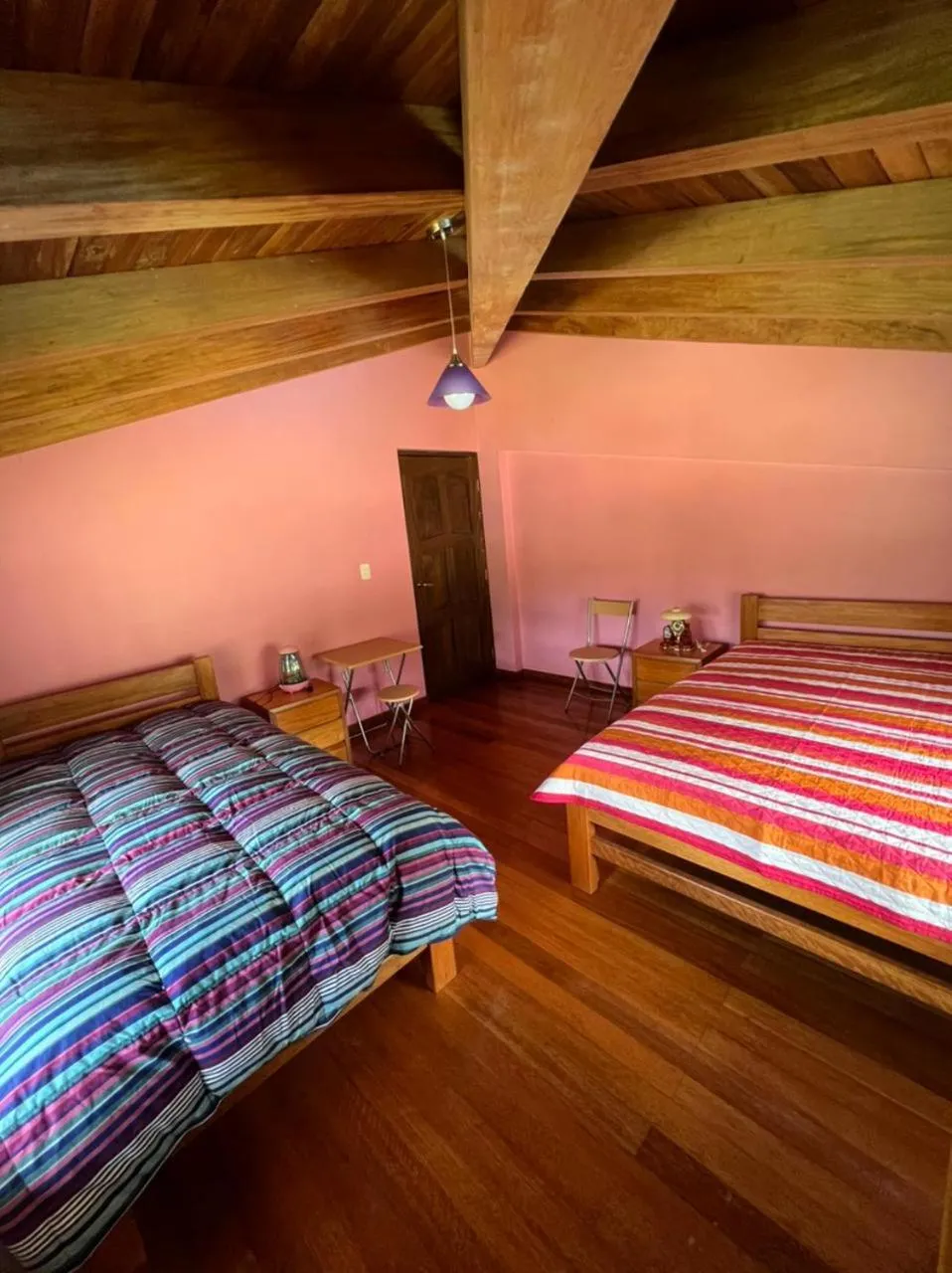 Bed in Lodge Acopampa Inn