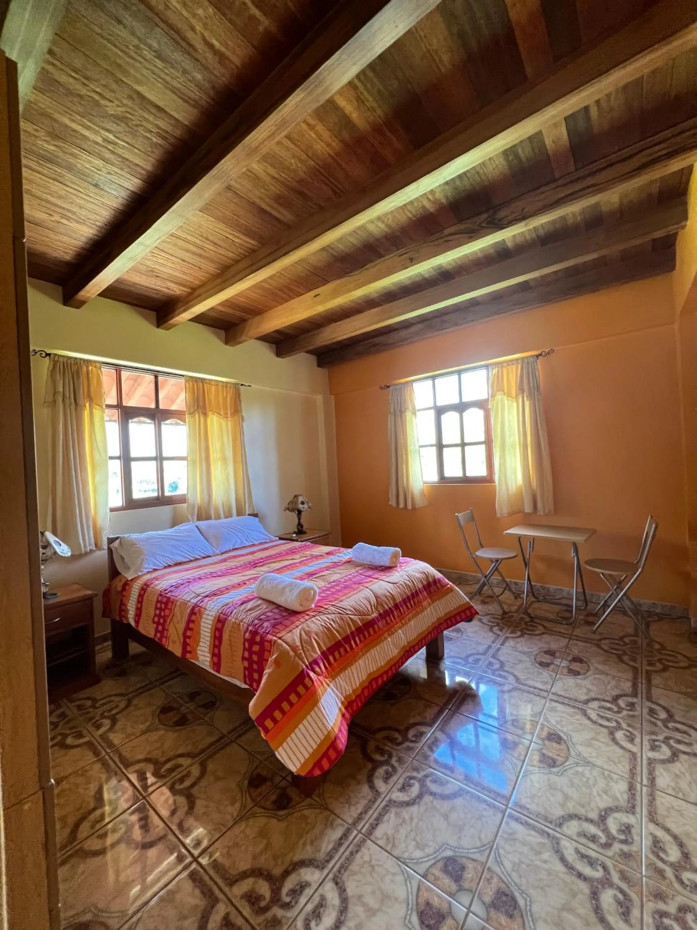 Bed in Lodge Acopampa Inn