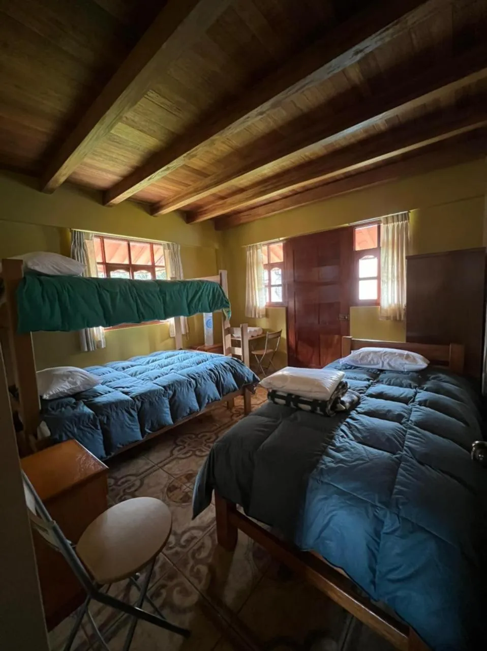 Bed in Lodge Acopampa Inn